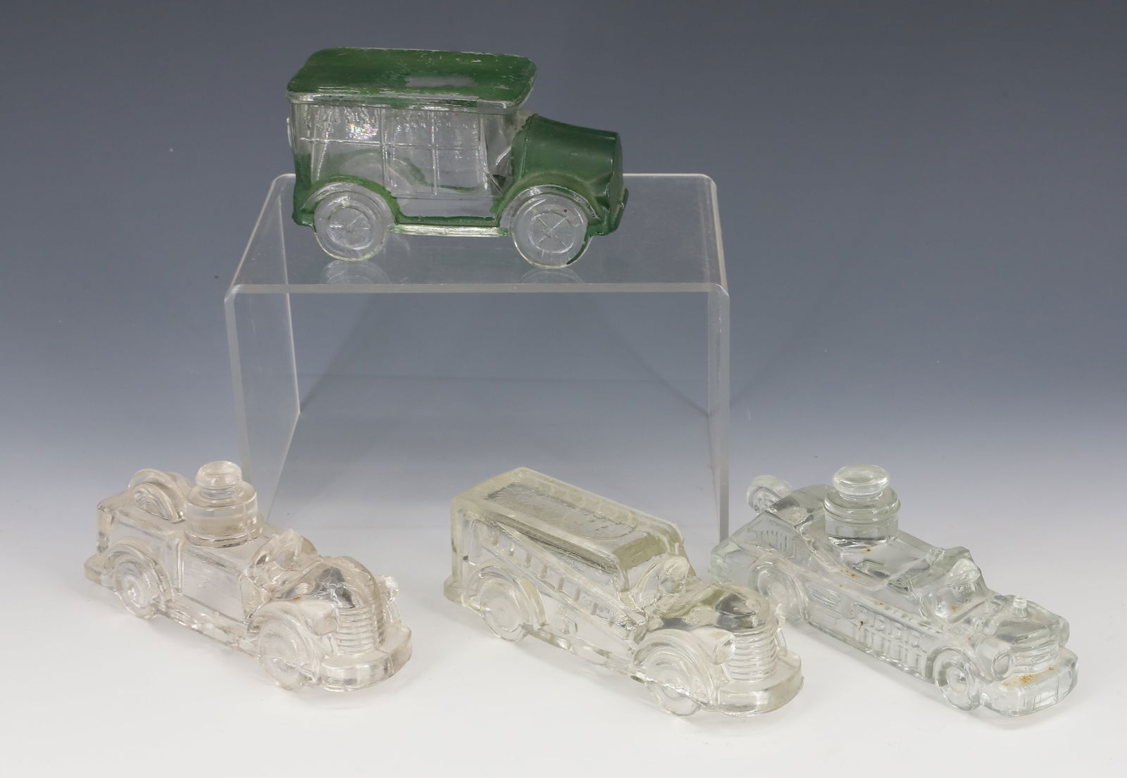 (4) FIRE TRUCK AND PAINTED CAR CANDY CONTAINERS (1 of 6)
