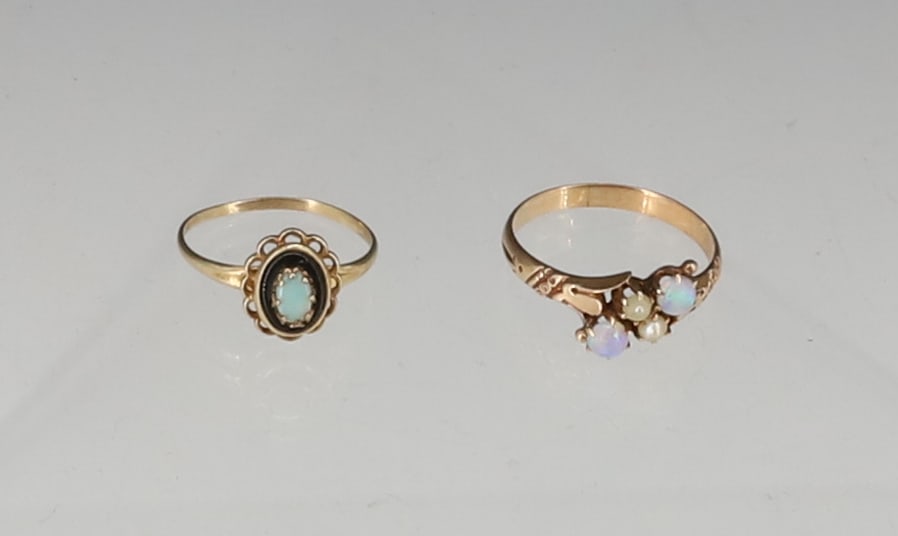 (2) VICTORIAN 10K OPAL RINGS: OPAL WITH ONYX, OPAL WITH SEED PEARLS SIZES 6",7 1/2 TOTAL WEIGHT 2.1 DWT PLEASE READ CAREFULLY - SINCE THIS IS A JEWELRY AND COIN SALE PLEASE NOTE. ITEMS MUST BE PAID FOR THROUGH LIVE