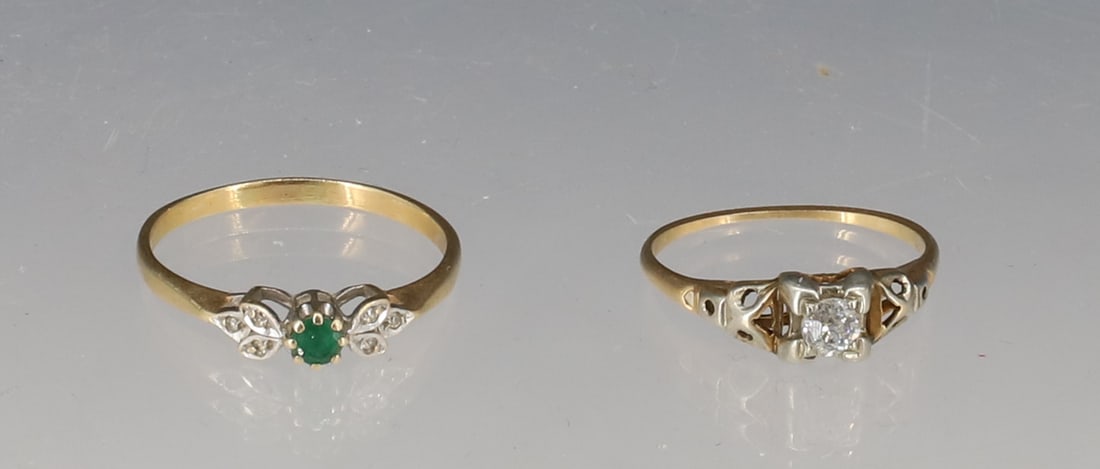 (2) 14K DIAMOND AND EMERALD RINGS: .20 CARAT DIAMOND SIZE 6, EMERALD RING SIZE 8 1/2 TOTAL WEIGHT 2.15 DWT PLEASE READ CAREFULLY - SINCE THIS IS A JEWELRY AND COIN SALE PLEASE NOTE. ITEMS MUST BE PAID FOR THROUGH LIVE AUCTIONEERS OR WI