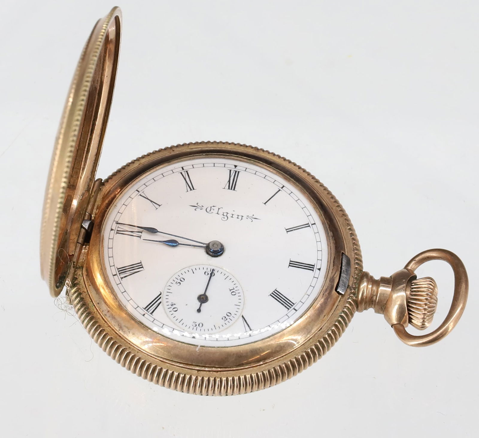 ELGIN POCKET WATCH: CLOSED FACE WITH SECOND HAND #7956785 (7) JEWELS GOLD FILLED VICTORIAN CASE 2" X 1 1/2" PLEASE READ CAREFULLY - SINCE THIS IS A JEWELRY AND COIN SALE PLEASE NOTE. ITEMS MUST BE PAID FOR THROUGH