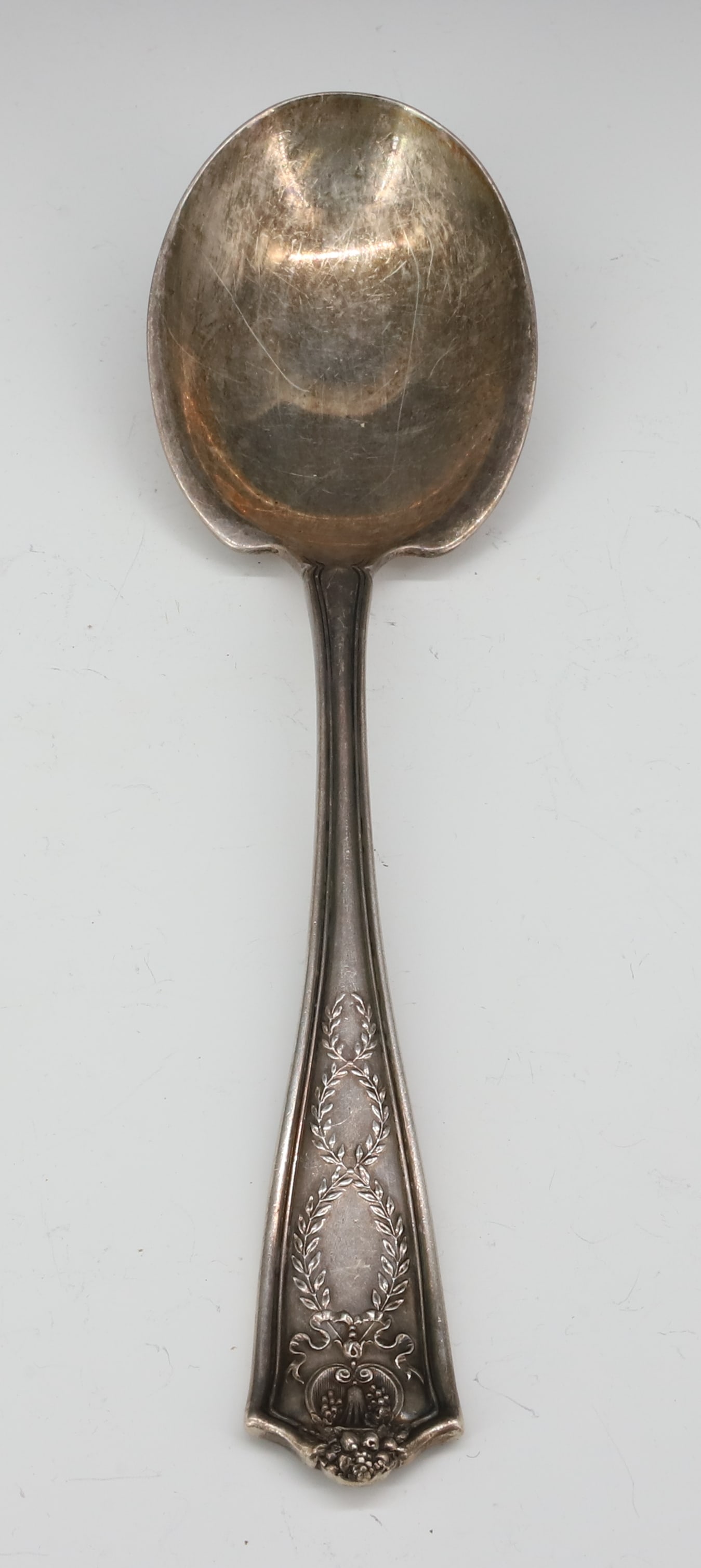 TIFFANY & CO STERLING SILVER BERRY SPOON: WINTHROP PATTERN 1909 9 1/4"L TOTAL WEIGHT 3.84 OZT PLEASE READ CAREFULLY - SINCE THIS IS A JEWELRY AND COIN SALE PLEASE NOTE. ITEMS MUST BE PAID FOR THROUGH LIVE AUCTIONEERS OR WITH CASH OR