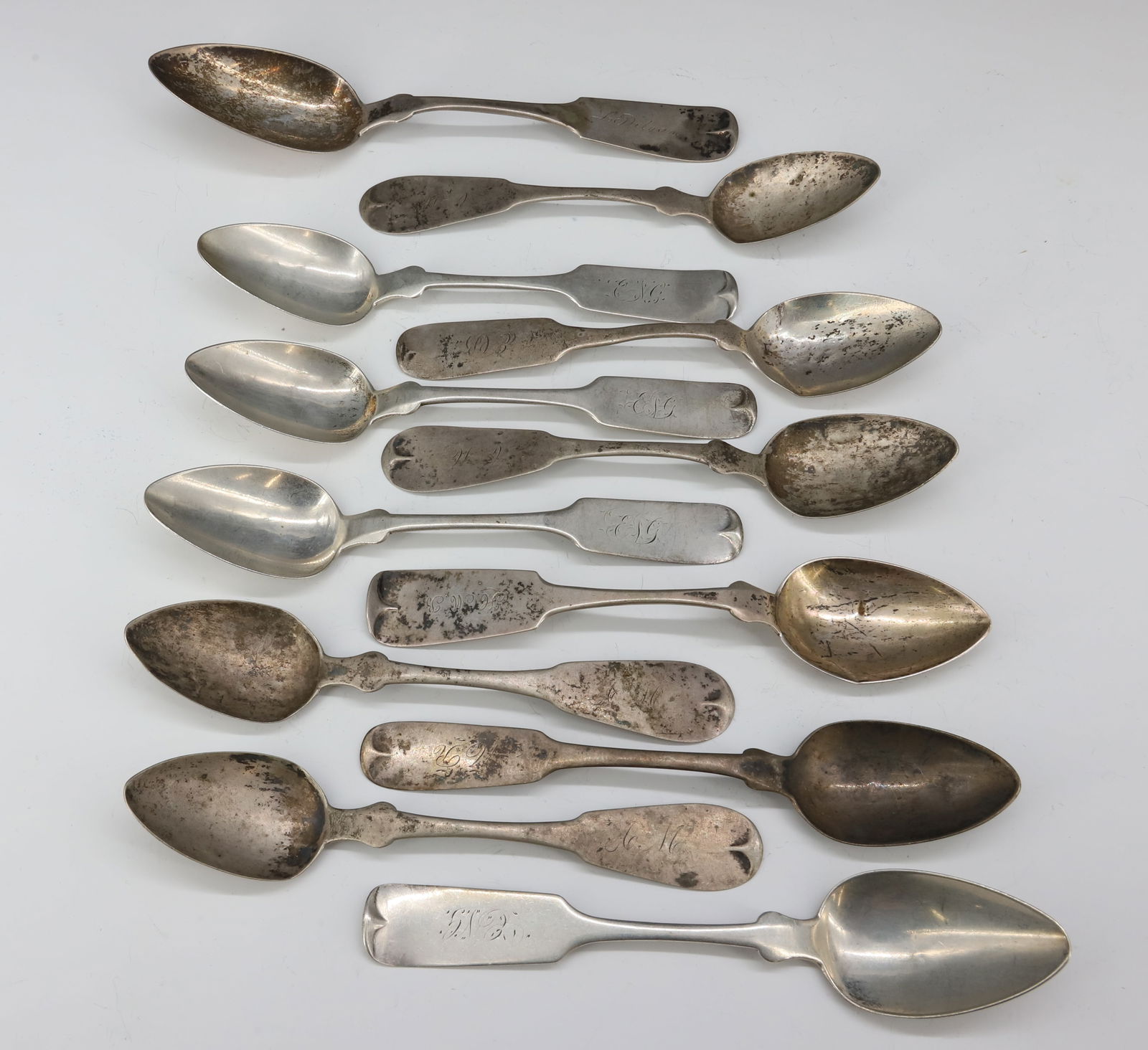 (11) AMERICAN COIN SILVER TEASPOONS: SOME MATCHING J.L.MOORE & CO,PSEUDO HALLMARKS, T. DOUGLAS 6" TOTAL WEIGHT 6.7 OZT PLEASE READ CAREFULLY - SINCE THIS IS A JEWELRY AND COIN SALE PLEASE NOTE. ITEMS MUST BE PAID FOR THROUGH LIVE AUCTION