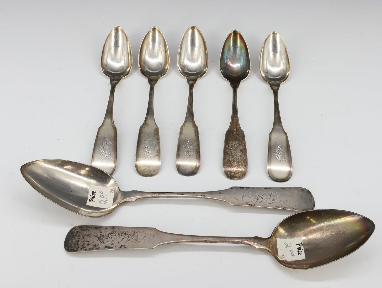 (7) AMERICAN COIN SILVER TEASPOONS/TABLESPOONS: MARKED N. HARDING, I.S. PORTER 6"L, 8 3/4"L TOTAL WEIGHT 5. 1 OZT PLEASE READ CAREFULLY - SINCE THIS IS A JEWELRY AND COIN SALE PLEASE NOTE. ITEMS MUST BE PAID FOR THROUGH LIVE AUCTIONEERS OR WITH CAS
