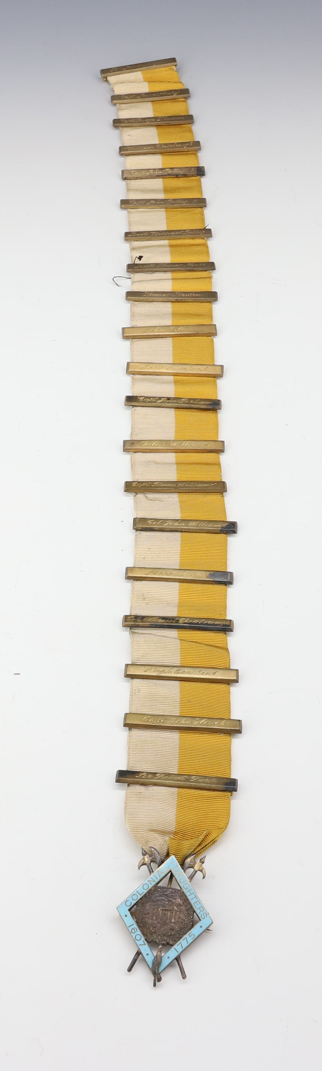 AMERICAN COLONIAL DAUGHTERS MEDAL: ENAMEL ORDER MEDAL WITH (20) ENGRAVED NAMES ALL MARKED CALDWELL SILVER (925) 18" X 1 1/2" TOTAL WEIGHT INCLUDING RIBBON 2.3 OZT PLEASE READ CAREFULLY - SINCE THIS IS A JEWELRY AND COIN SALE