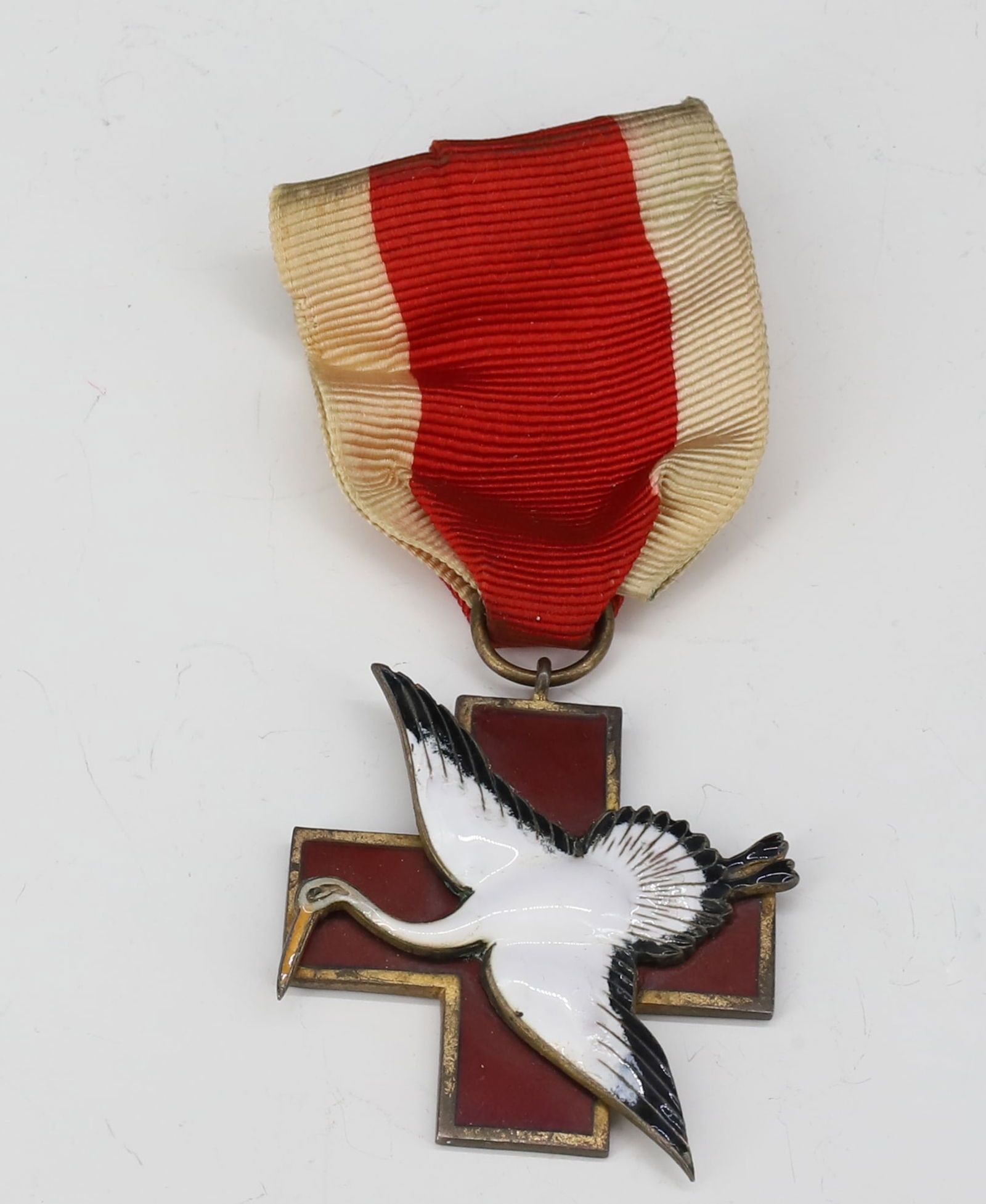 ORDER OF THE WHITE CRANE MEDAL: BAILEY BANKS & BIDDLE STERLING AND ENAMEL 3"L PLEASE READ CAREFULLY - SINCE THIS IS A JEWELRY AND COIN SALE PLEASE NOTE. ITEMS MUST BE PAID FOR THROUGH LIVE AUCTIONEERS OR WITH CASH OR CHECK IN
