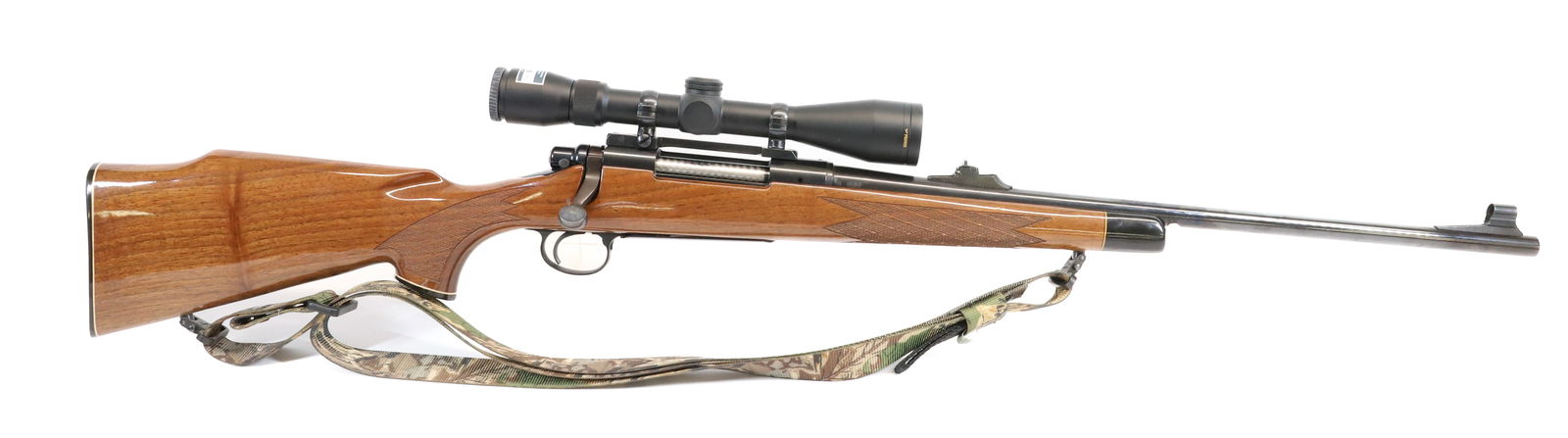 REMINGTON MODEL 700 BDL CUSTOM DELUXE: 30-06 SPRING, SERIAL# B6640551, WITH NIKON "THE PRIMOS" 3X9 SCOPE - AND SLING THIS GUN REQUIRES REGISTRATION OR AN FFL TRANSFER TO PURCHASE PLEASE READ CAREFULLY BEFORE BIDDING. ALL PAYMENTS MUST BE M