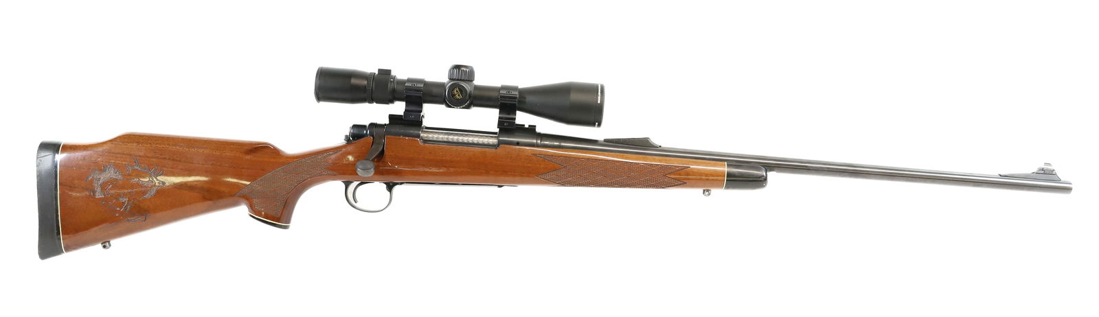 REMINGTON MODEL 700 BDL BOLT ACTION RIFLE: 300 WIN MAG, SERIAL# C6645655, WITH NIKON BUCKMASTERS 3X9 SCOPE - CARVED ELK IN STOCK THIS GUN REQUIRES REGISTRATION OR AN FFL TRANSFER TO PURCHASE PLEASE READ CAREFULLY BEFORE BIDDING. ALL