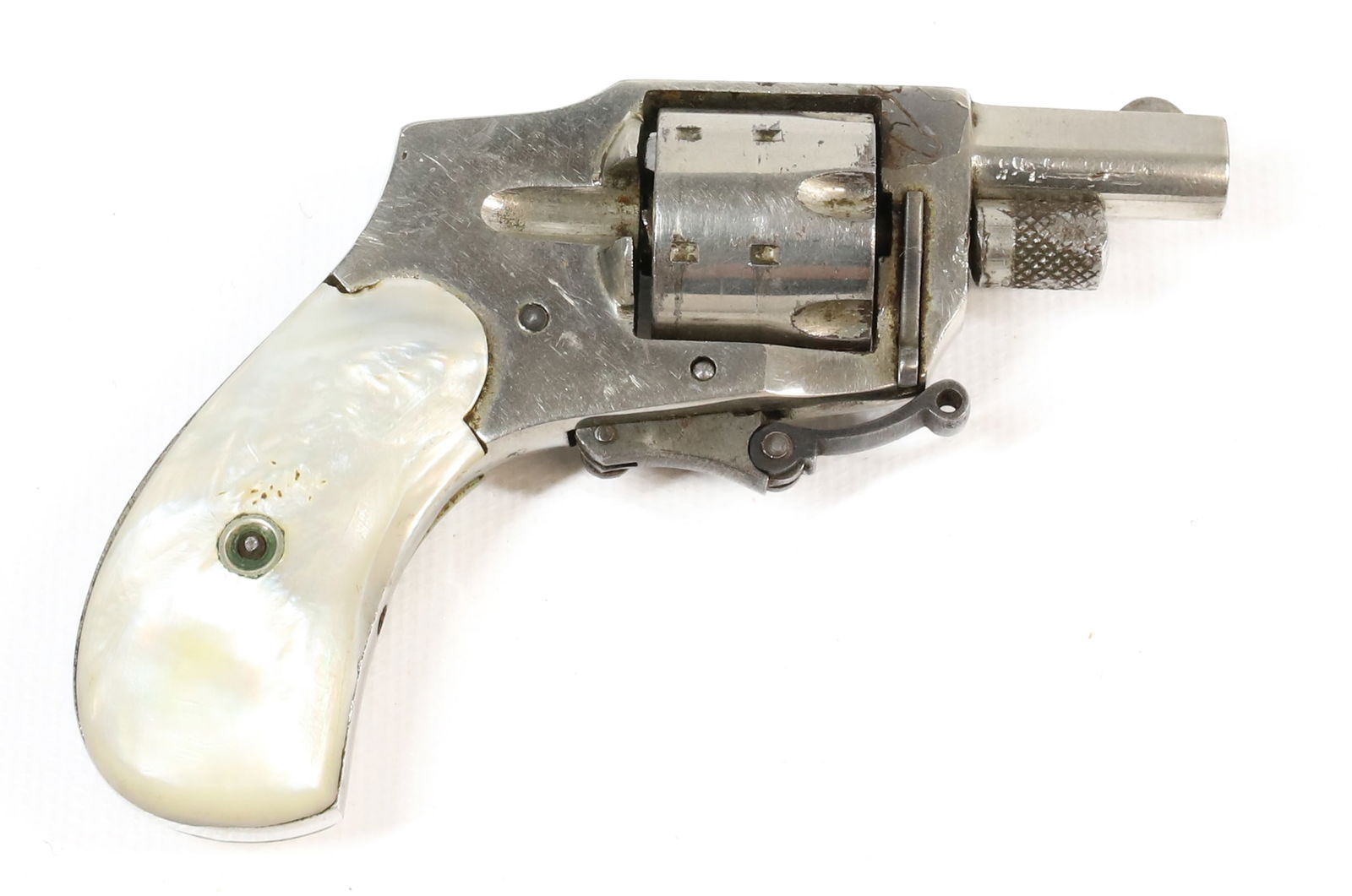 KOLB BABY HAMMERLESS REVOLVER: .22 SHORT, NSN, MOTHER OF PEARL GRIPS, FOLDING TRIGGER, 1 1/4" BARREL THIS GUN REQUIRES REGISTRATION OR AN FFL TRANSFER TO PURCHASE PLEASE READ CAREFULLY BEFORE BIDDING. ALL PAYMENTS MUST BE MADE
