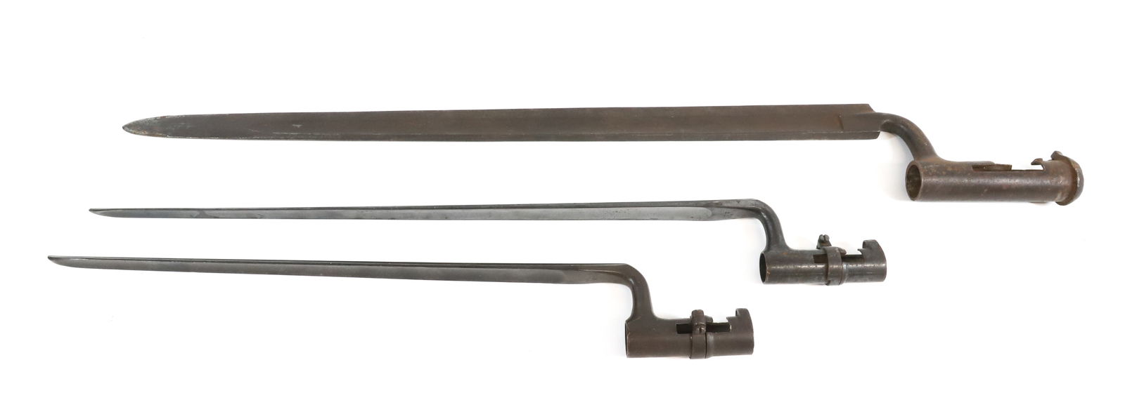 LOT OF EARLY BAYONETS: (3) TOTAL INCLUDING - (2) TRI-ANGULAR BAYONETS MARKED ; U.S. - AND SINGLE UNMARKED BAYONET - LONGEST MEASURES 27"