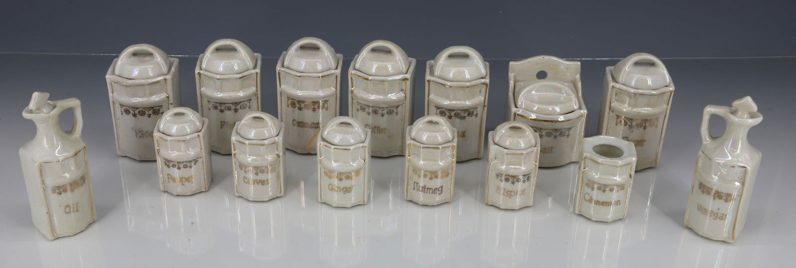 CHILD'S PORCELAIN CANISTER SET (1 of 4)