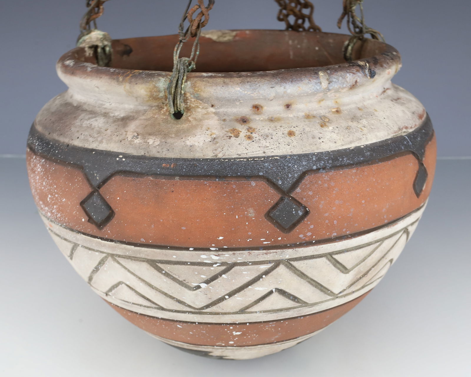 WELLER "SUEVO" HANGING POT: ART POTTERY HANGING FLOWER POT. 7 1/4" H. PLEASE READ CAREFULLY - TEMS MUST BE PAID FOR THROUGH LIVE AUCTIONEERS OR WITH CASH OR CHECK IN PERSON - Terms for Purchasing and Shipping of Auction