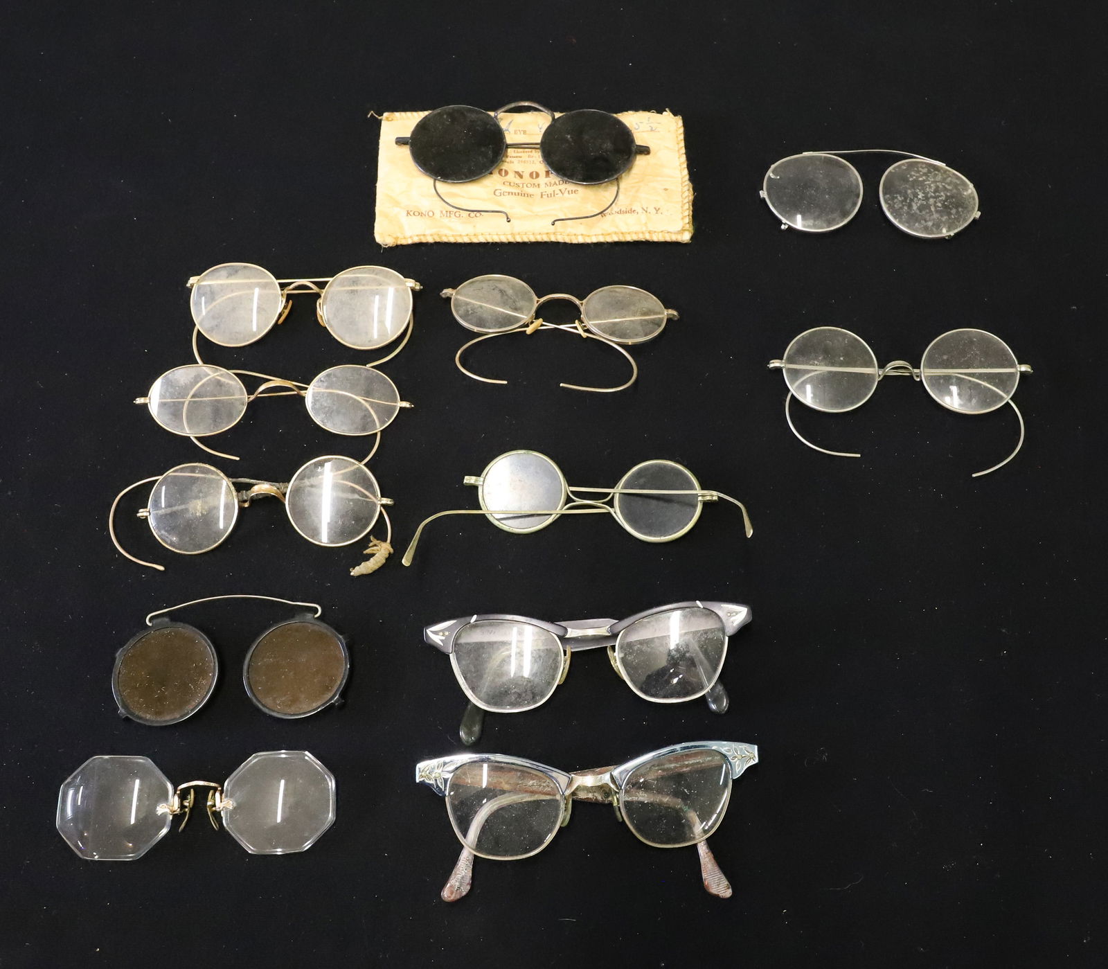 LOT OF VINTAGE EYEGLASSES / SUNGLASSES: INCLUDING: THREE PAIRS OF SUNGLASSES (ONE CLIP-ON) GRAY MRKD. WILSON. (6) WIRE RIM (ONE CLIP-ON). (2) CAT GLASS STYLE. ONE PAIR WITH OCTAGONAL LENSES IN ORIGINAL POUCH. PLEASE READ CAREFULLY -