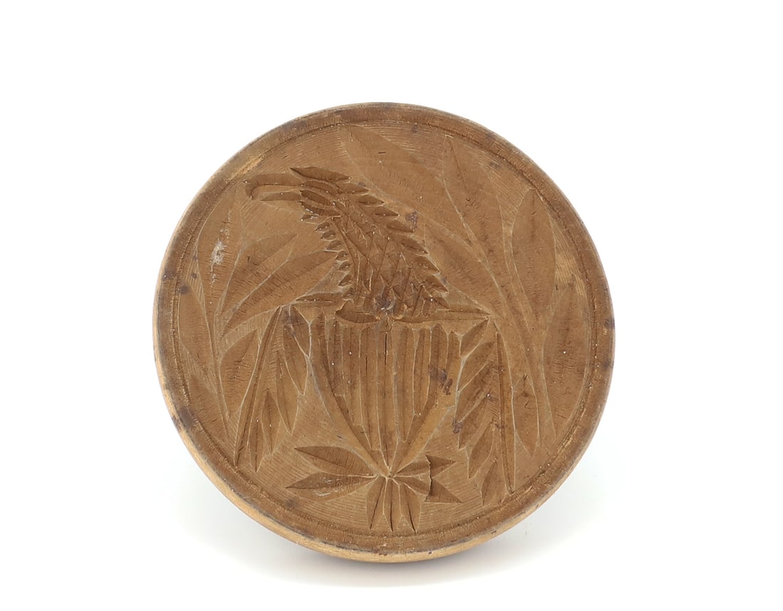 CARVED EAGLE BUTTER STAMP: EAGLE WITH "SHIELD" BODY AND CROSSED ARROWS AT FEET. 3 3/4" D. PLEASE READ CAREFULLY - TEMS MUST BE PAID FOR THROUGH LIVE AUCTIONEERS OR WITH CASH OR CHECK IN PERSON - Terms for Purchasing and