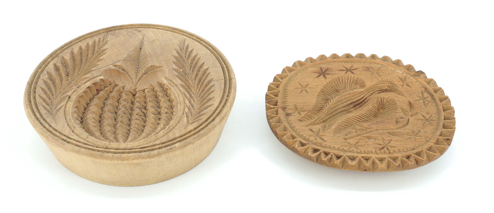 (2) CARVED BUTTER STAMPS: BIRD ON BRANCH MOTIF, MRKD.ON BACK "JERUSHA FLAGLER, 1843" (POSSIBLY GERMAN) 3 1/2" D. THE OTHER IS A FRUIT WITH LEAVES (NO HANDLE) 3 3/4" D. PLEASE READ CAREFULLY - TEMS MUST BE PAID FOR THROUGH