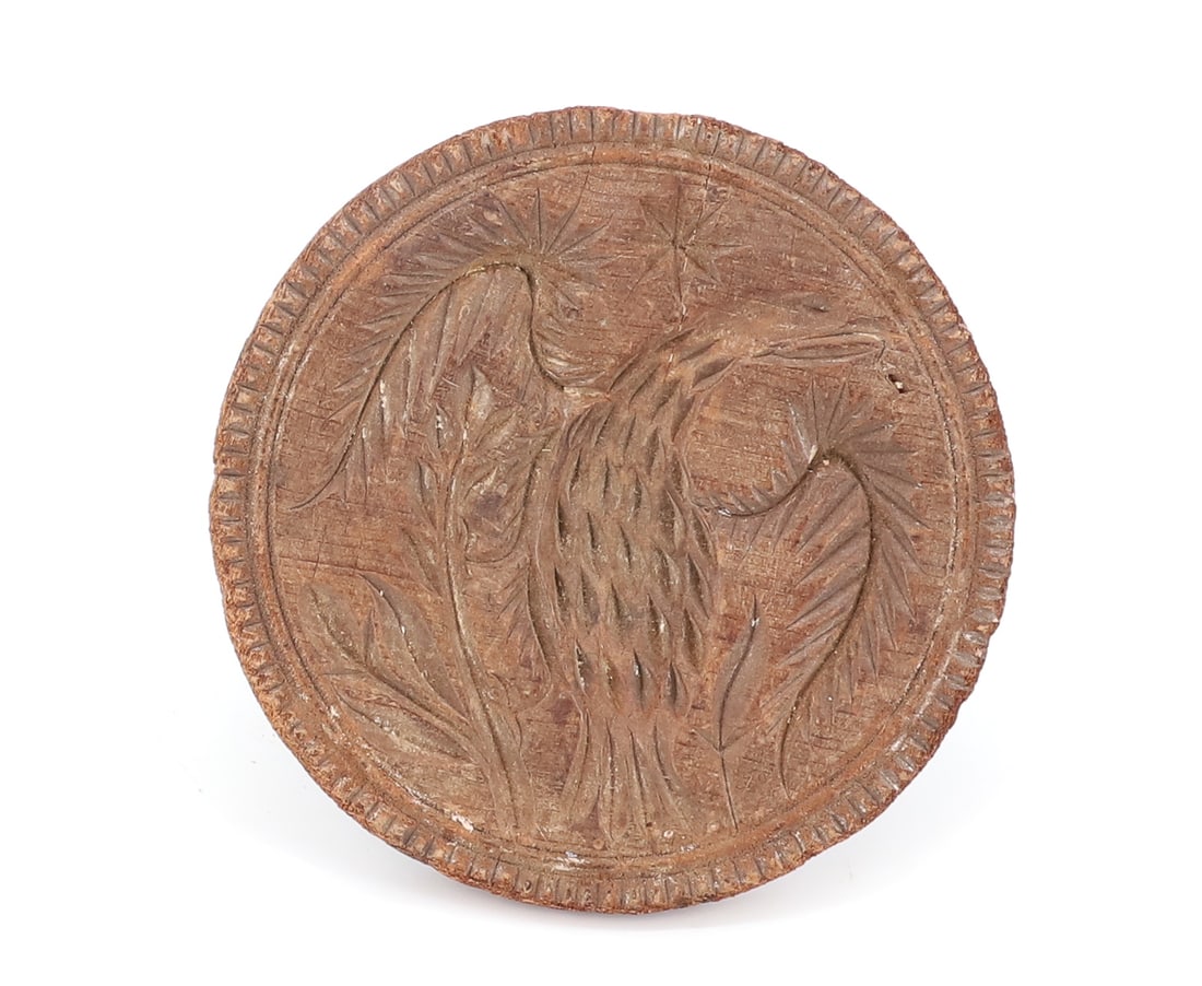 CARVED EAGLE BUTTER STAMP: DETAILED BIRD WITH CHIP CARVED EDGE. 4 1/2" D. PLEASE READ CAREFULLY - TEMS MUST BE PAID FOR THROUGH LIVE AUCTIONEERS OR WITH CASH OR CHECK IN PERSON - Terms for Purchasing and Shipping of