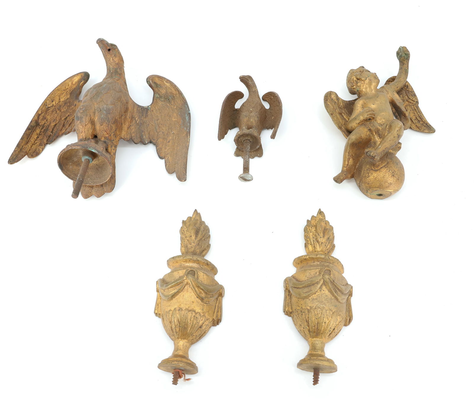 FLAG TOPPERS AND GILT BRONZE FINIALS: (2) BRASS FLAG TOPPERS 3 1/4" AND 5 1/2" HEIGHTS OF EAGLES. (2) GILT BRONZE URNS AND SEATED CHERUB 6 7/8" H. PLEASE READ CAREFULLY - TEMS MUST BE PAID FOR THROUGH LIVE AUCTIONEERS OR WITH CASH