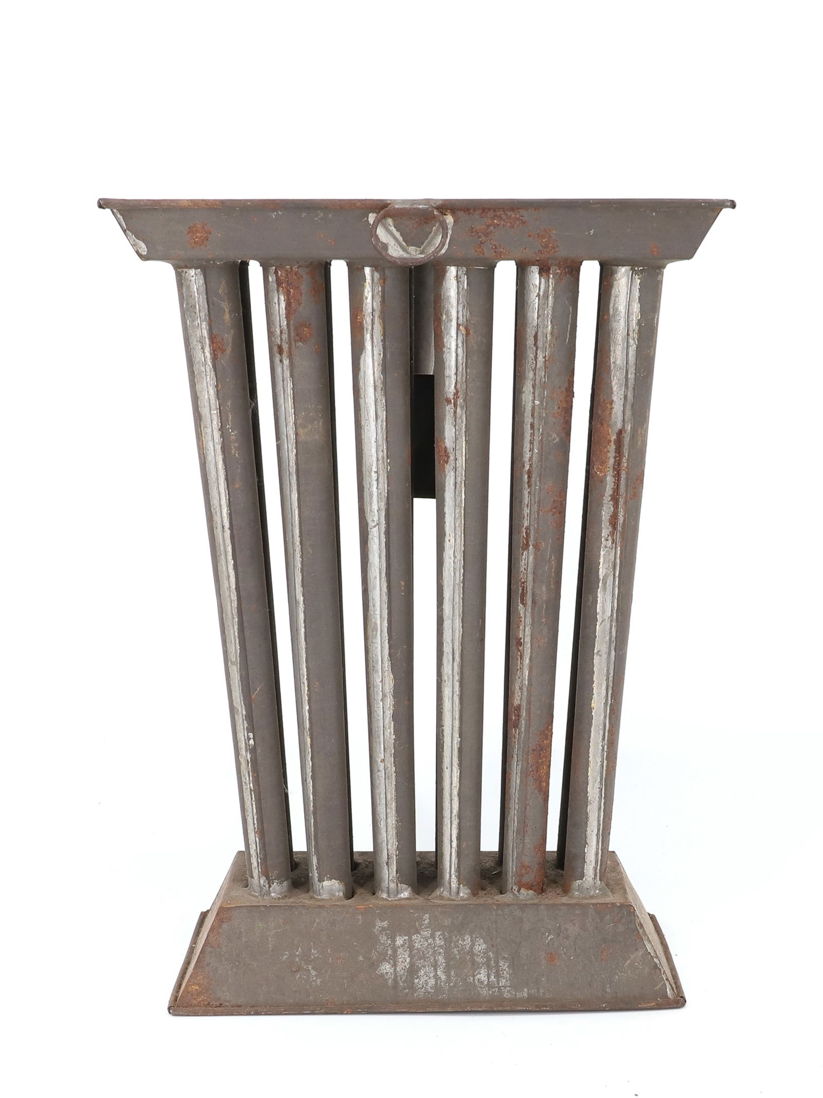 TWELVE-HOLE CANDLE MOLD: UNUSUAL CANTED BASE. SINGLE HANDLE. 11 1/2" X 8 1/2". PLEASE READ CAREFULLY - TEMS MUST BE PAID FOR THROUGH LIVE AUCTIONEERS OR WITH CASH OR CHECK IN PERSON - Terms for Purchasing and Shipping