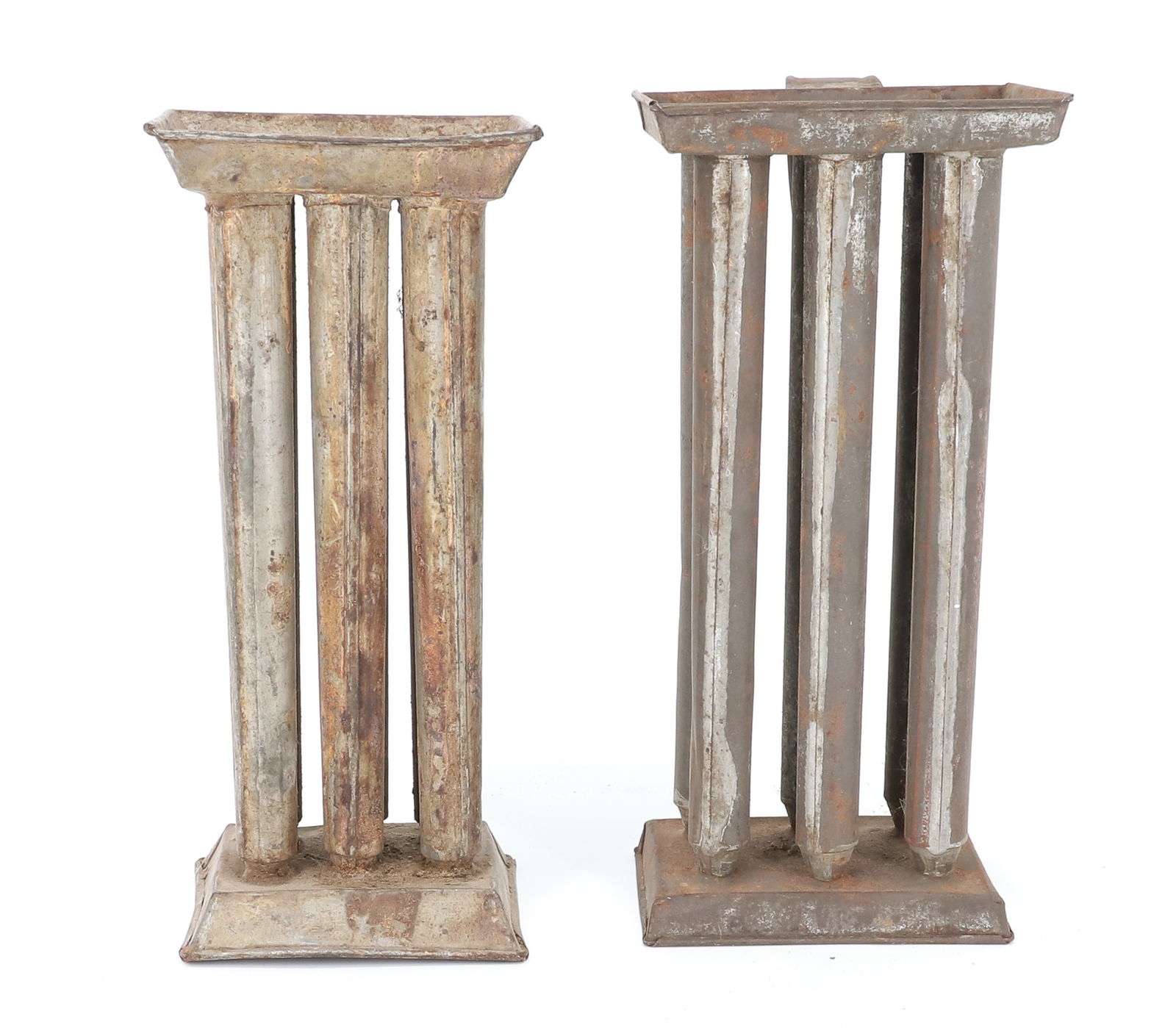 (2) SIX-HOLE CANDLE MOLDS: EACH HAVE SINGLE STRAP HANDLE. 9 1/2" AND 9 3/4" HEIGHTS. PLEASE READ CAREFULLY - TEMS MUST BE PAID FOR THROUGH LIVE AUCTIONEERS OR WITH CASH OR CHECK IN PERSON - Terms for Purchasing and