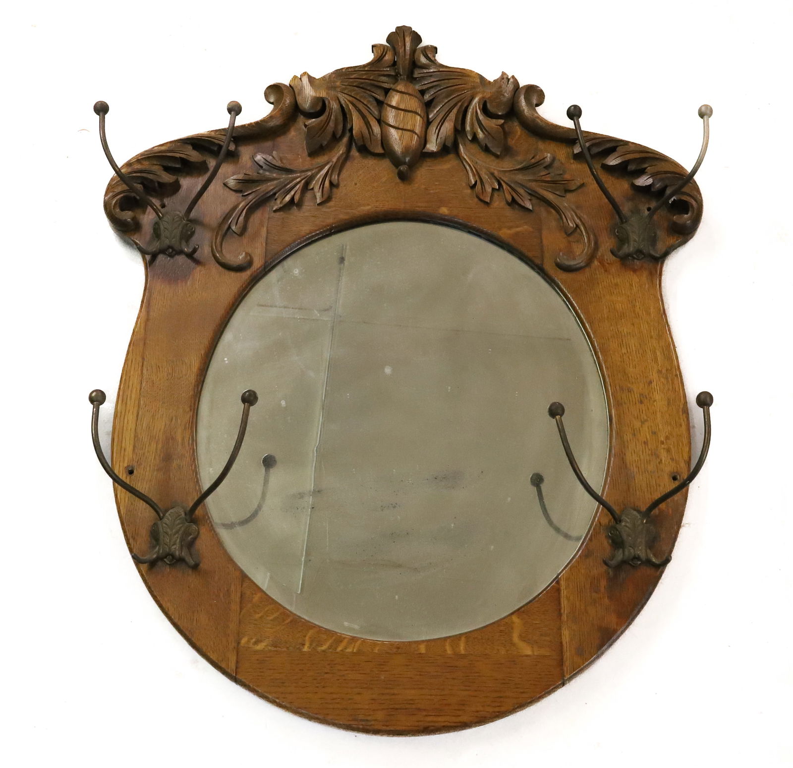 OAK MIRROR HAT RACK: ROUND BEVELED MIRROR. METAL HOOKS. 33 1/4" X 27". PLEASE READ CAREFULLY - TEMS MUST BE PAID FOR THROUGH LIVE AUCTIONEERS OR WITH CASH OR CHECK IN PERSON - Terms for Purchasing and Shipping of Auction