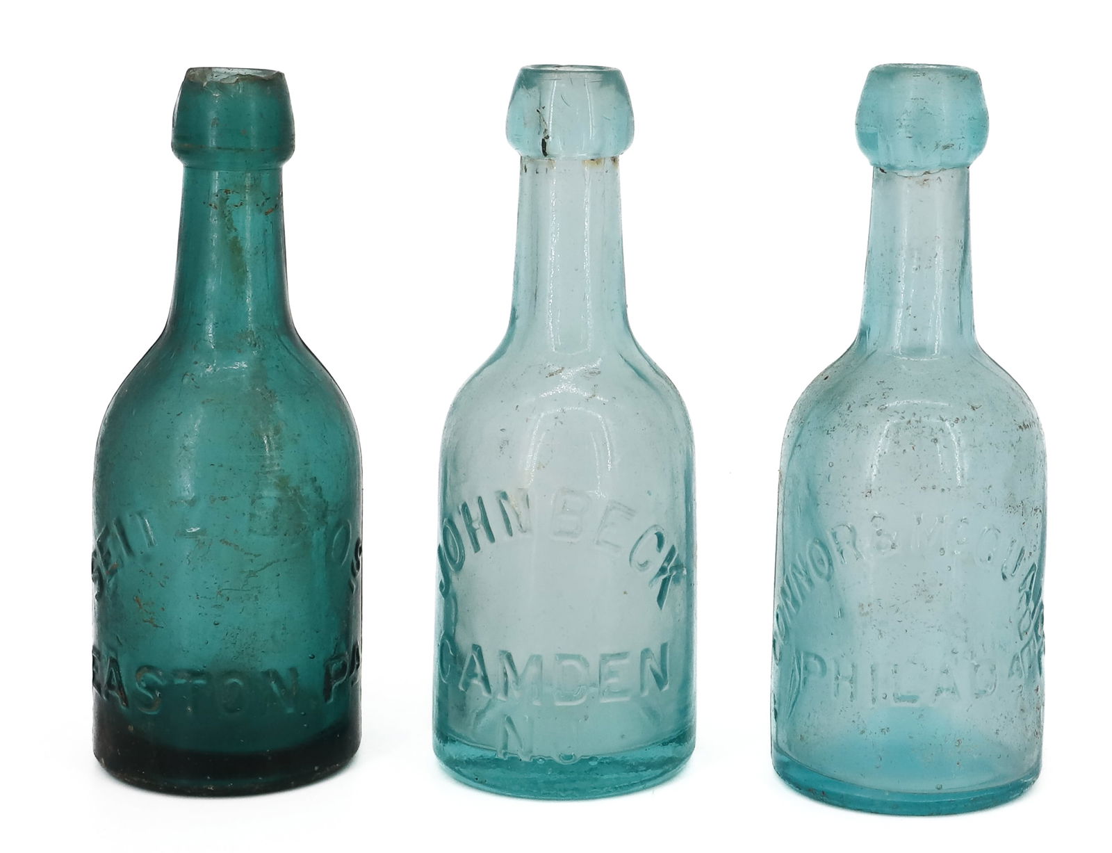 CAMDEN, EASTON, PHILA. SODA BOTTLES: AQUA "JOHN BECK...CAMDEN NJ" (7" H). AQUA "CONNOR & McQUAIDE...PHILADA" (7" H). GREEN "SEITZ BROS...EASTON, PA" 6 7/8" H. PLEASE READ CAREFULLY - TEMS MUST BE PAID FOR THROUGH LIVE AUCTIONEERS