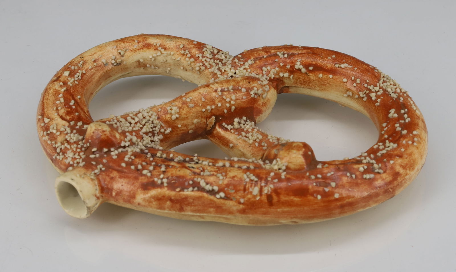 POTTERY PRETZEL FLASK: MRKD. "PATENT APPL'D FOR" 5 1/2" L. PLEASE READ CAREFULLY - TEMS MUST BE PAID FOR THROUGH LIVE AUCTIONEERS OR WITH CASH OR CHECK IN PERSON - Terms for Purchasing and Shipping of Auction Items.