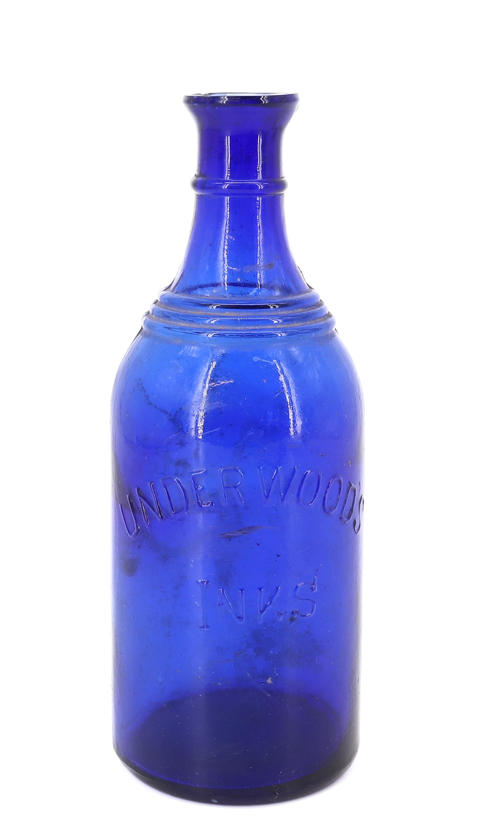 LARGE COBALT BLUE INK BOTTLE: EMBOSSED "UNDERWOOD'S INKS" SPOUT AT TOP LIP. 9 3/4" H. PLEASE READ CAREFULLY - TEMS MUST BE PAID FOR THROUGH LIVE AUCTIONEERS OR WITH CASH OR CHECK IN PERSON - Terms for Purchasing and