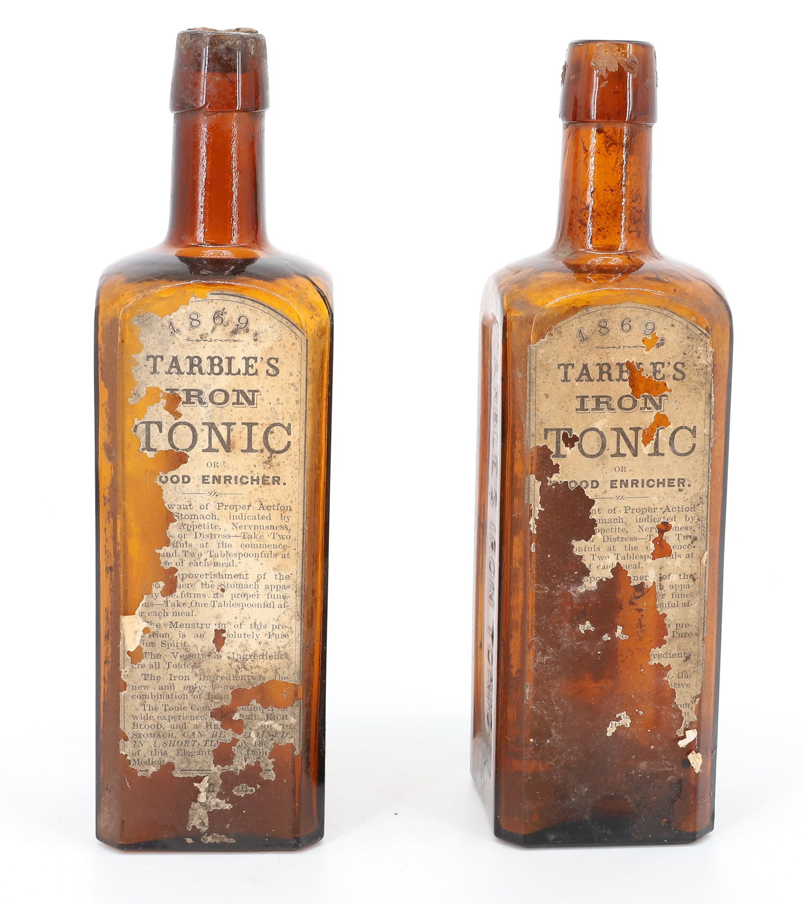 (2) HONESDALE, PA AMBER BOTTLES: TARBLE'S IRON TONIC, HONESDALE, PA. PARTIAL ORIGINAL PAPER LABELS. 9 1/4" H. PLEASE READ CAREFULLY - TEMS MUST BE PAID FOR THROUGH LIVE AUCTIONEERS OR WITH CASH OR CHECK IN PERSON - Terms for
