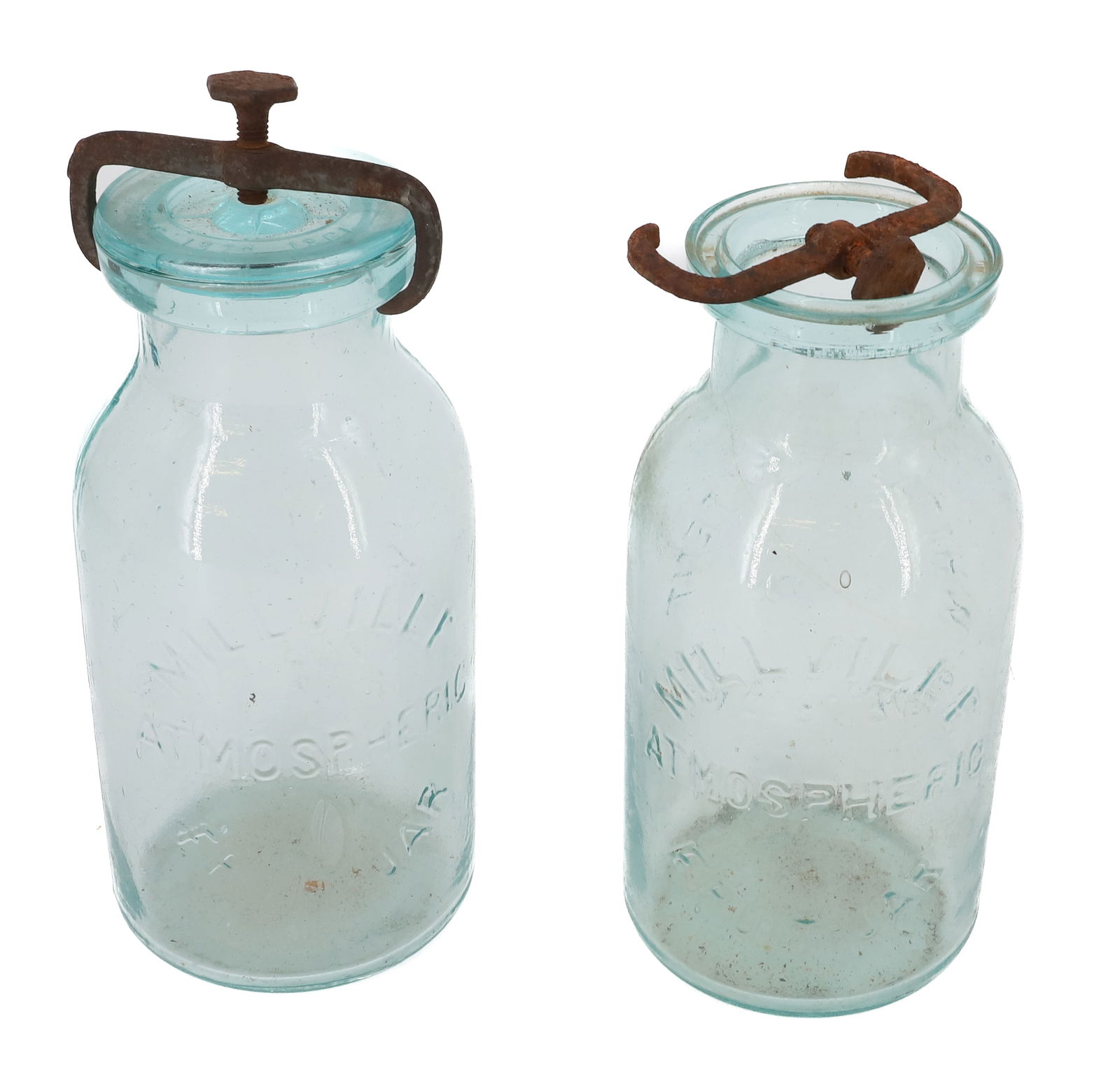 (2) MILLVILLE ATMOSPHERIC FRUIT JARS: ONE HAS LID AND IRON CLOSURE. MRKD. ON OPPOSITE SIDES "WHITALLS PATENT JUNE 18TH 1861" BOTTOMS MRKD. "1" AND "10". 8" H. PLEASE READ CAREFULLY - TEMS MUST BE PAID FOR THROUGH LIVE AUCTIONEERS OR WITH