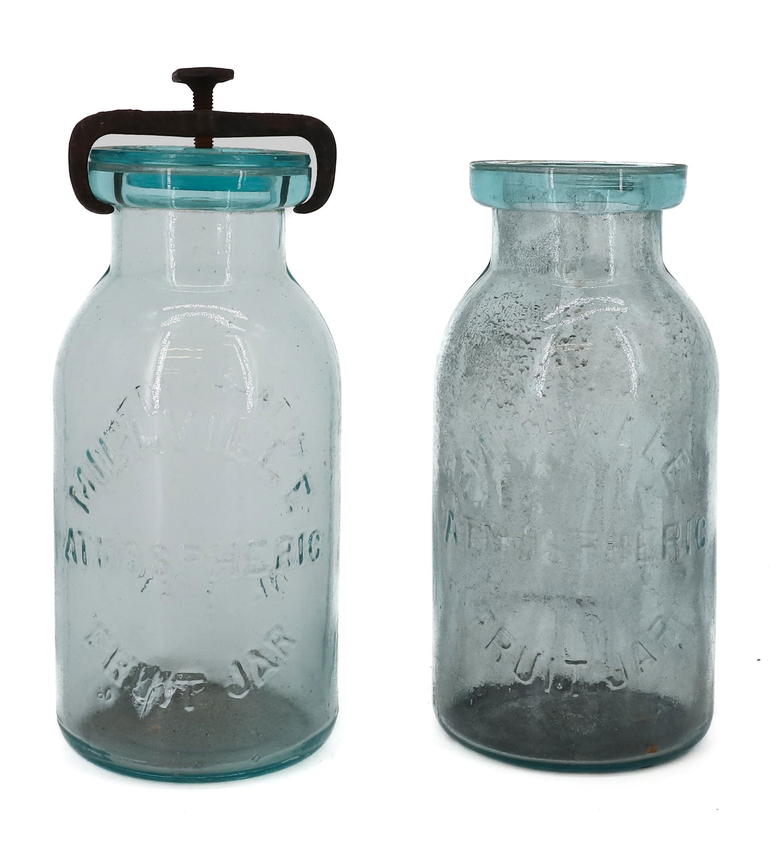 (2) MILLVILLE ATMOSPHERIC FRUIT JARS: ONE HAS LID AND IRON CLOSURE. MRKD. ON OPPOSITE SIDES "WHITALLS PATENT JUNE 18TH 1861" BOTTOMS MRKD. "1" AND "10". 8" H. PLEASE READ CAREFULLY - TEMS MUST BE PAID FOR THROUGH LIVE AUCTIONEERS
