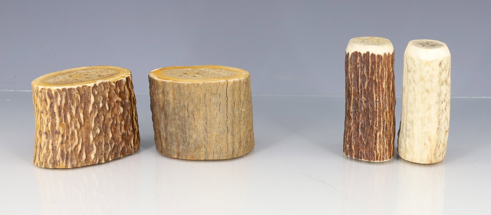 (2) PAIRS OF ANTLER SALT / PEPPER SHAKERS: CARVED ANTLER. CORK PLUGS. TALLEST 3" H. PLEASE READ CAREFULLY - ITEMS MUST BE PAID FOR THROUGH LIVE AUCTIONEERS OR WITH CASH OR CHECK IN PERSON - Terms for Purchasing and Shipping of Auction