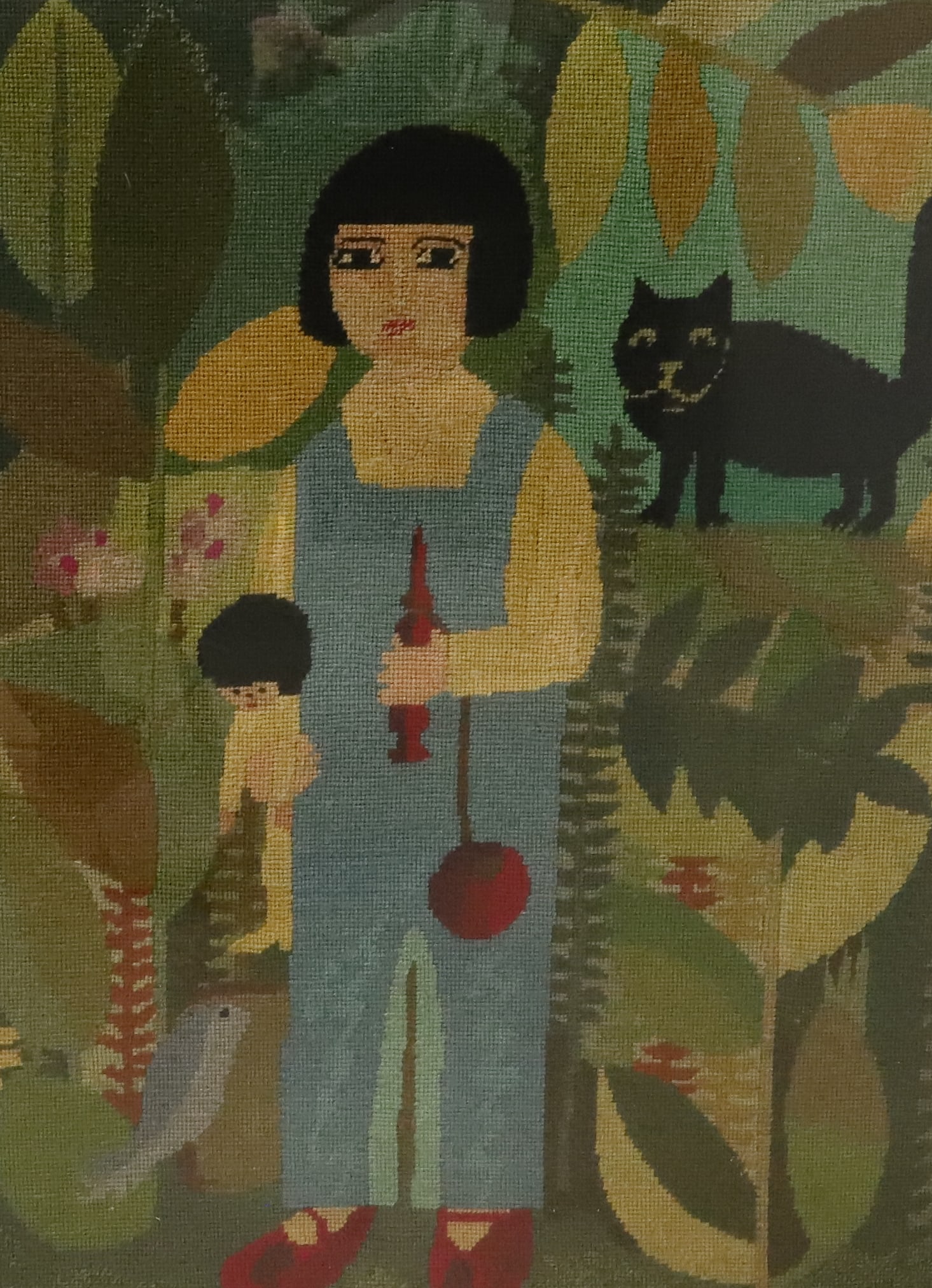 FOLK ART FRAMED TEXTILE OF CHILD AND CAT: NEEDLEPOINT PORTRAIT OF CHILD IN BLUE DRESS / RED SHOES HOLDING DOLL AND HORN. BLACK CAT TO RIGHT. FRAMED UNDER GLASS. 30" X 22 3/4". PLEASE READ CAREFULLY - ITEMS MUST BE PAID FOR THROUGH LIVE AUCTIO