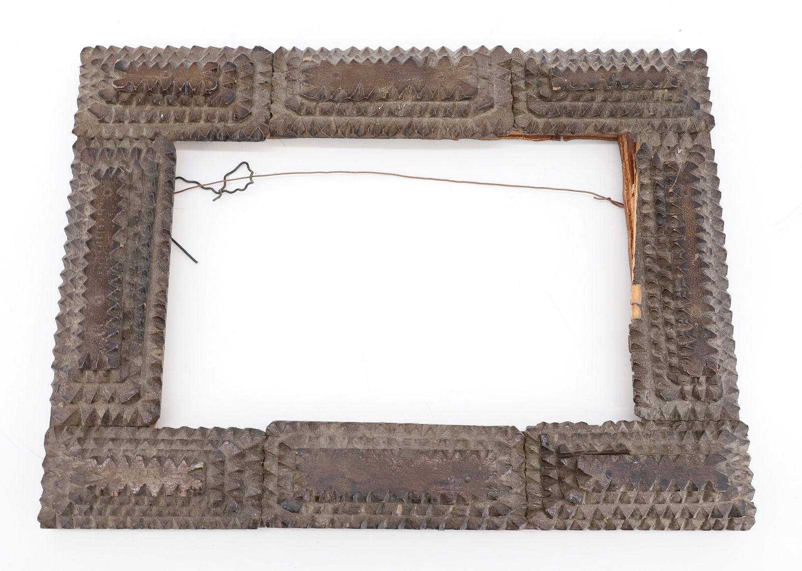 TRAMP ART WOODEN FRAME: CHIP CARVED LAYERS. 8 1/4" X 11". INTERIOR 5" X 7 1/2". PLEASE READ CAREFULLY - ITEMS MUST BE PAID FOR THROUGH LIVE AUCTIONEERS OR WITH CASH OR CHECK IN PERSON - Terms for Purchasing and Shipping of A