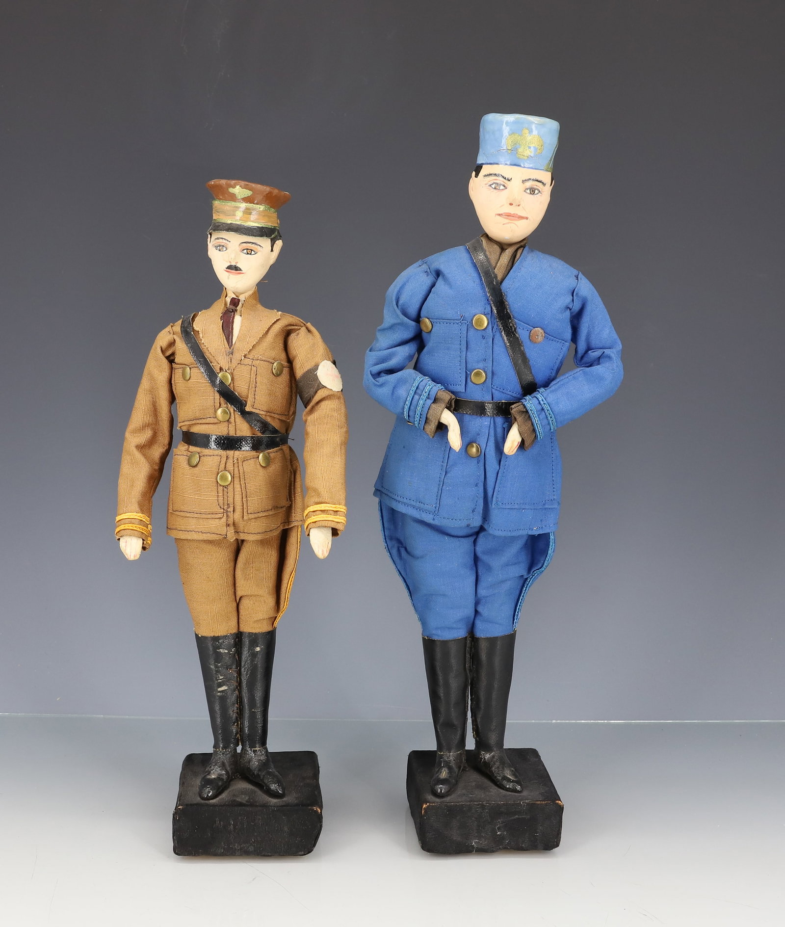 (2) SAROFF CHARACTER DOLLS: ADOLF HITLER AND MUSSOLINI. LABELED ON BOTTOM. LARGEST 12 1/2" H. PLEASE READ CAREFULLY - ITEMS MUST BE PAID FOR THROUGH LIVE AUCTIONEERS OR WITH CASH OR CHECK IN PERSON - Terms for Purchasing and Shi