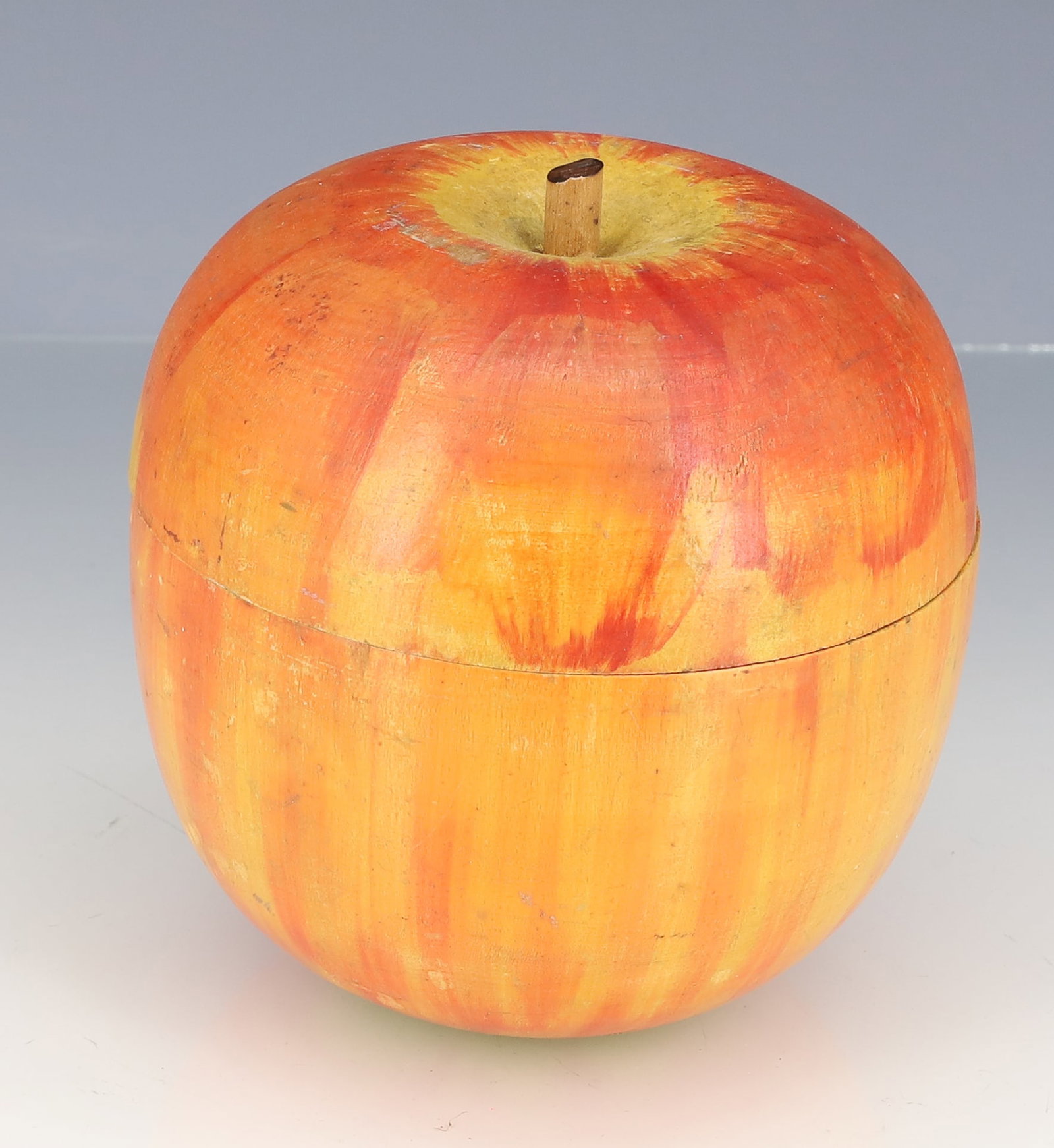 PAINTED WOODEN APPLE W/ HORSE RACE GAME: LARGE APPLE WITH INTERIOR HORSERACE SPIN GAME INSIDE. 4" X 3 3/4". PLEASE READ CAREFULLY - ITEMS MUST BE PAID FOR THROUGH LIVE AUCTIONEERS OR WITH CASH OR CHECK IN PERSON - Terms for Purchasing