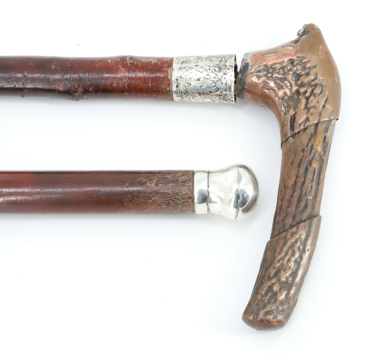 (2) ANTIQUE CANES / WALKING STICK: COPPER-CLAD HAND GRIP ABOVE DECORATED STERLING SILVER BAND 34" L. WITH, WALKING STICK WITH SILVER TOPPER (ENGRAVED "FOR ....") 34 1/4" L. PLEASE READ CAREFULLY - ITEMS MUST BE PAID FOR THROUGH