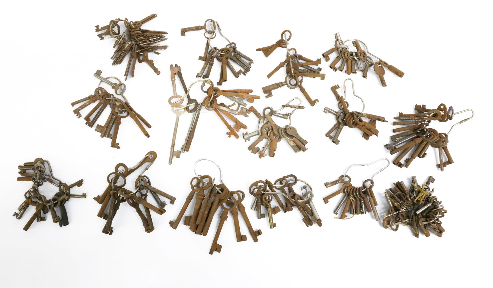 LARGE LOT OF ANTIQUE KEYS: VARIOUS CAST IRON / STEEL KEYS. LARGEST 3 5/8" L. PLEASE READ CAREFULLY - ITEMS MUST BE PAID FOR THROUGH LIVE AUCTIONEERS OR WITH CASH OR CHECK IN PERSON - Terms for Purchasing and Shipping of Auction