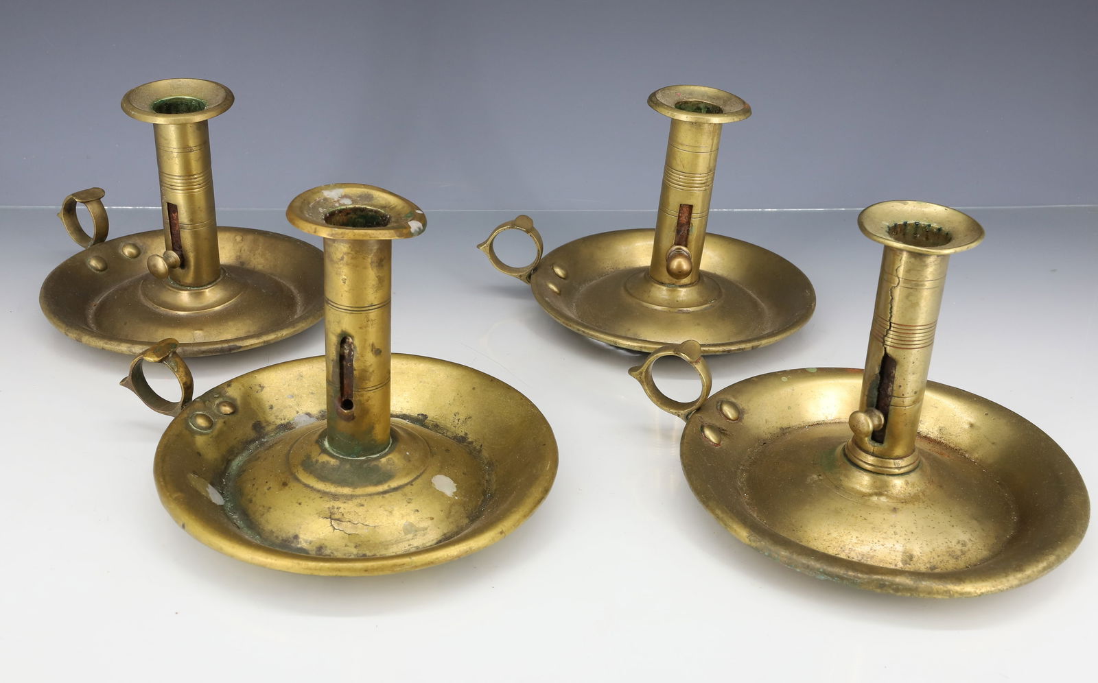 LOT OF PUSH-UP BRASS CHAMBERSTICKS (1 of 4)