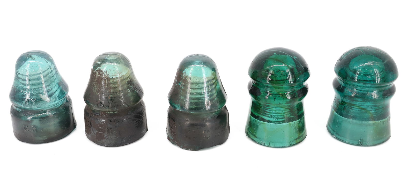 LOT OF BROOKFIELD GLASS INSULATORS: INCLUDING: (2) W. BROOKFIELD, NEW YORK (GREEN) 4 1/8" H. (3) W. BROOKFIELD, 55 FULTON ST. NY (CAUVET'S PATENT, JULY 25, 1865) LATEST PATENT 1870. PLEASE READ CAREFULLY - ITEMS MUST BE PAID FOR