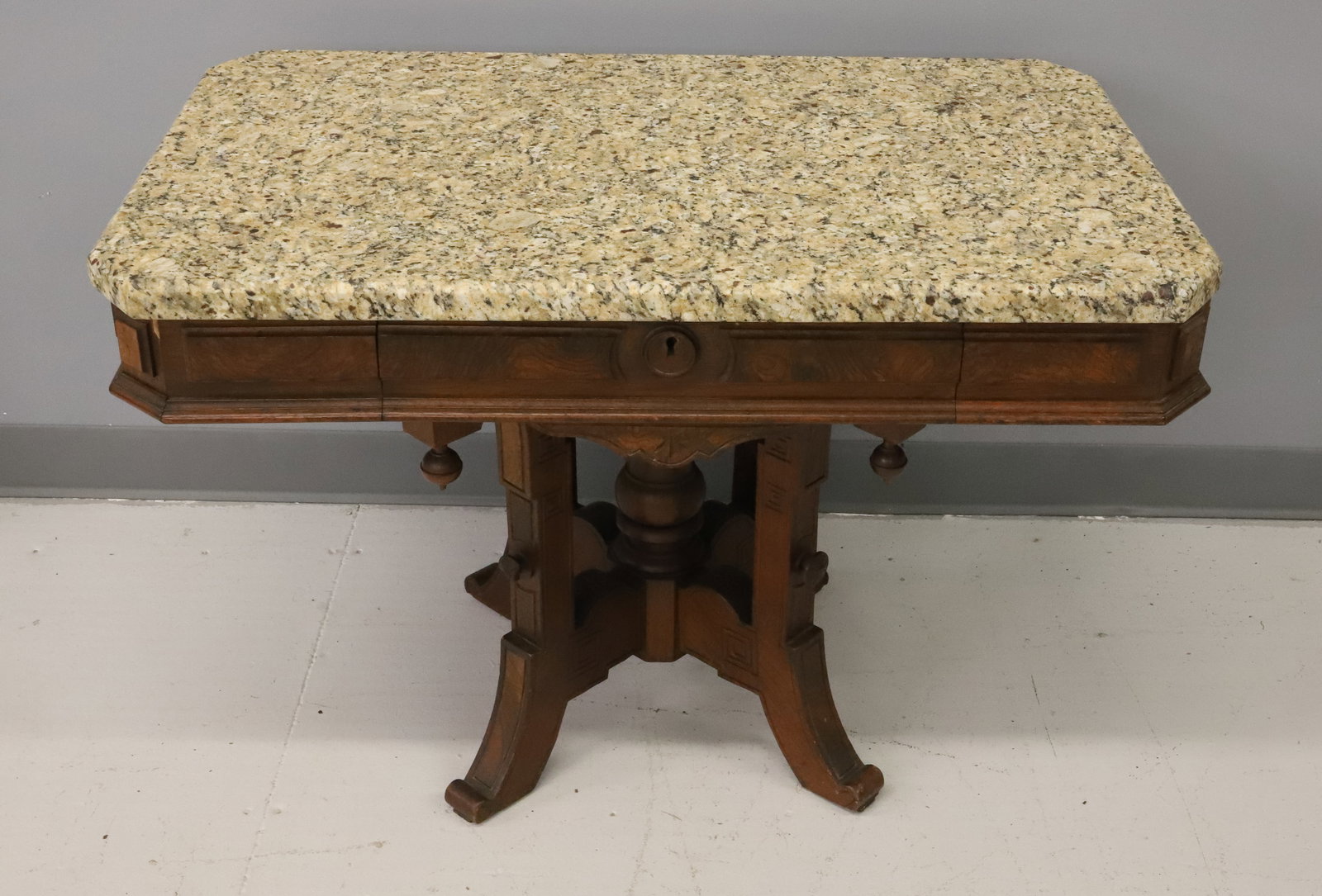 VICTORIAN MARBLE TOP TABLE: LOW TABLE WITH SINGLE DRAWER. SPECKLED MARBLE TOP. 23" X 35" X 22". PLEASE READ CAREFULLY - ITEMS MUST BE PAID FOR THROUGH LIVE AUCTIONEERS OR WITH CASH OR CHECK IN PERSON - Terms for Purchasing