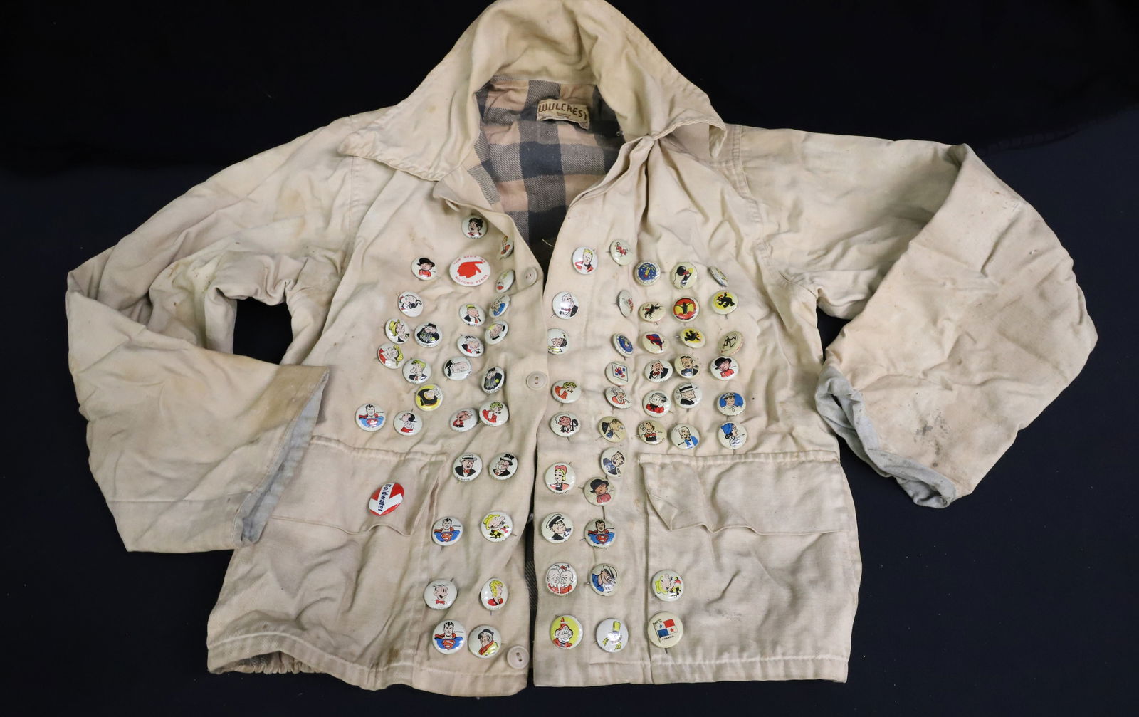 VINTAGE CHILD'S JACKET WITH PINS: CARTOON AND SQUADRON PINS. JACKET BY "WULCREST". PLEASE READ CAREFULLY - ITEMS MUST BE PAID FOR THROUGH LIVE AUCTIONEERS OR WITH CASH OR CHECK IN PERSON - Terms for Purchasing and Shipping of
