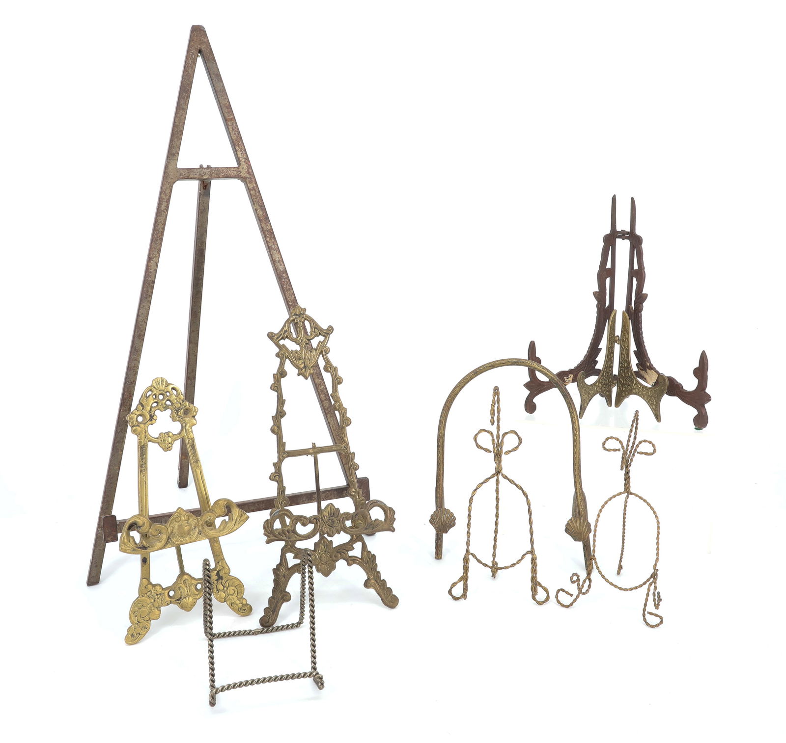LOT OF TABLETOP EASELS: BRASS AND WIRE. VARIOUS SIZES AND STYLES. LARGEST 18 1/2" X 10". PLEASE READ CAREFULLY - ITEMS MUST BE PAID FOR THROUGH LIVE AUCTIONEERS OR WITH CASH OR CHECK IN PERSON - Terms for Purchasing and Ship