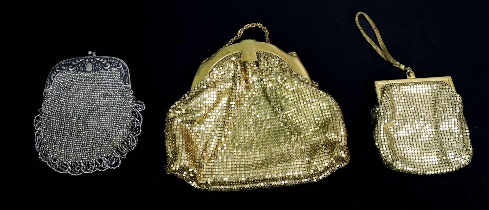 (2) GOLD MESH AND BEADED BAGS: LARGEST MRKD. WHITING & DAVIS 6" X 7". SILVER BEADED AND SUEDE BAG 5" X 4 1/4". PLEASE READ CAREFULLY - ITEMS MUST BE PAID FOR THROUGH LIVE AUCTIONEERS OR WITH CASH OR CHECK IN PERSON - Terms for