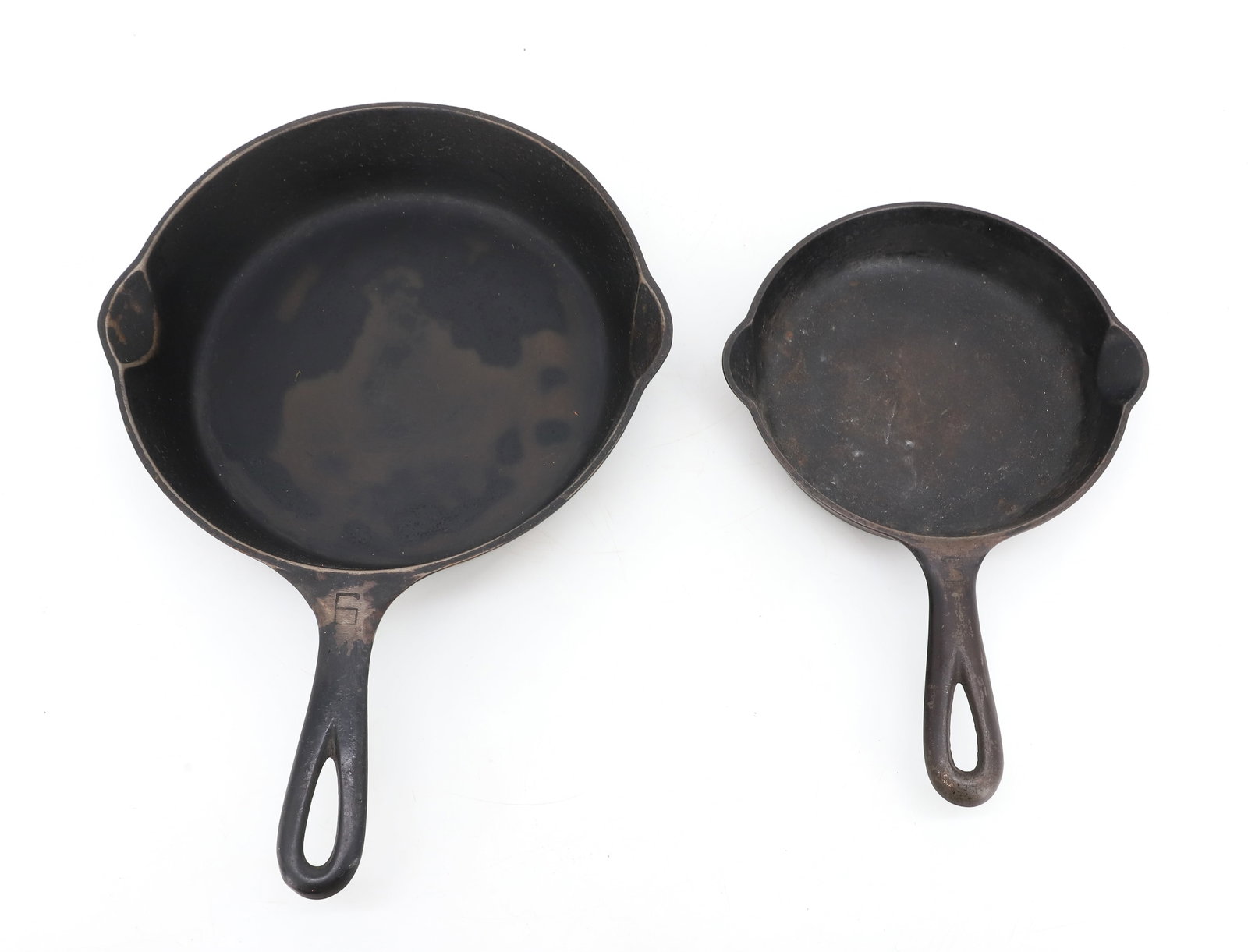 GRISWOLD #3 AND #6 CAST IRON SKILLETS: NO. 3 GRISWOLD, ERIE PA., 709B AND 6 GRISWOLD, ERIE PA., U.S.A." 6 1/2" AND 9" DIAMETERS. PLEASE READ CAREFULLY - ITEMS MUST BE PAID FOR THROUGH LIVE AUCTIONEERS OR WITH CASH OR CHECK IN PERSON - Term