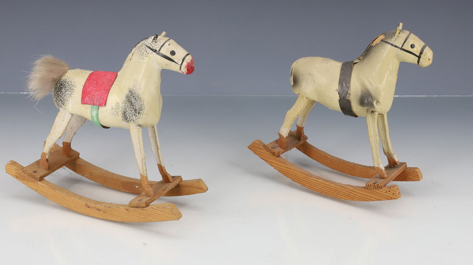 (2) COMPOSITION TOY ROCKING HORSES: PAINTED COMPOSITION ON WOODEN ROCKERS. 5 1/4" X 5 5/8". PLEASE READ CAREFULLY - ITEMS MUST BE PAID FOR THROUGH LIVE AUCTIONEERS OR WITH CASH OR CHECK IN PERSON - Terms for Purchasing and Shipping of A