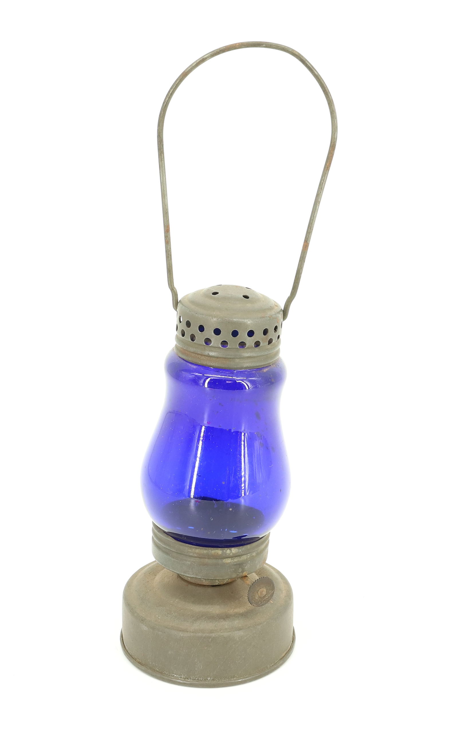 SKATER'S LAMP, COBALT BLUE GLOBE: TIN LANTERN WITH COBALT BLUE GLOBE. 6 1/4" H. PLEASE READ CAREFULLY - ITEMS MUST BE PAID FOR THROUGH LIVE AUCTIONEERS OR WITH CASH OR CHECK IN PERSON - Terms for Purchasing and Shipping of Auction Ite