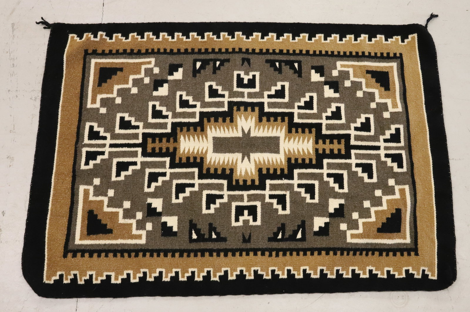 VINTAGE NAVAJO RUG: TWO GREY HILLS-STYLE DESIGN. 41 1/2" X 28 1/2". PLEASE READ CAREFULLY - ITEMS MUST BE PAID FOR THROUGH LIVE AUCTIONEERS OR WITH CASH OR CHECK IN PERSON - Terms for Purchasing and Shipping of