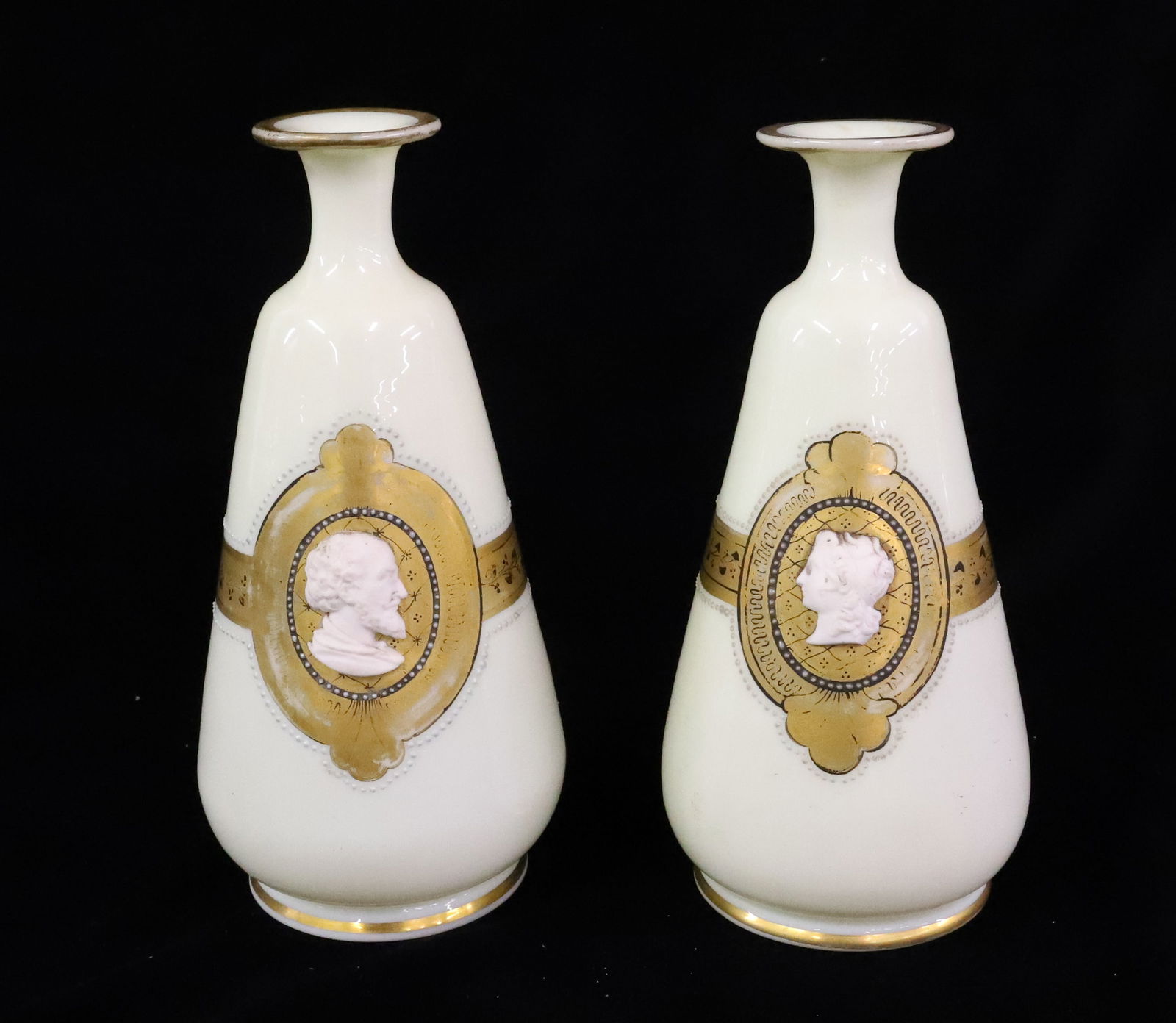 19TH C ENGLISH CREAM OPALINE COLOGNE BOTTLES: TWO MATCHING COLOGNES WITH RELIEF PORTRAITS ON SHAKESPEARE AND WORDSWORTH ON CREAM OPALINE GLASS CIRCA 1860 PLEASE READ CAREFULLY - ITEMS MUST BE PAID FOR THROUGH LIVE AUCTIONEERS OR WITH CASH OR CHEC