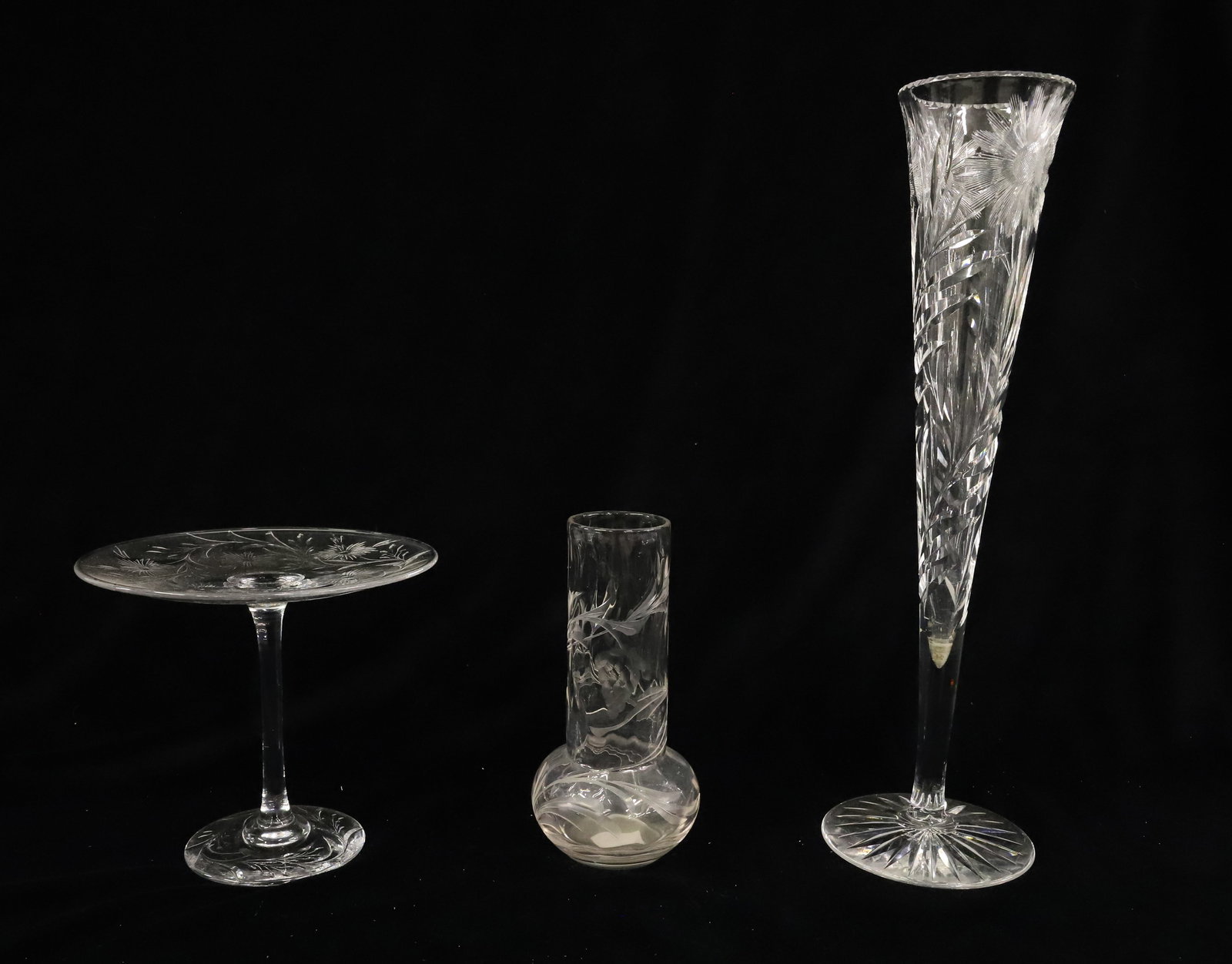 (3) DORFLINGER CUT GLASS: DAISY TRUMPET VASE, TAZA DIFFERENT DAISY PATTERN AND VASE WITH GRAPE ENGRAVING 6" TO 13" PLEASE READ CAREFULLY - ITEMS MUST BE PAID FOR THROUGH LIVE AUCTIONEERS OR WITH CASH OR CHECK IN PERSON - Terms