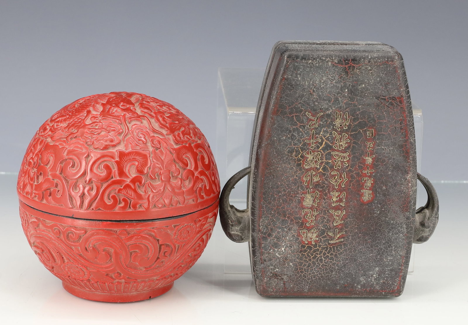 CHINESE CINNABAR AND PAPER MACHE BOXES: CINNABAR ROUND BOX WITH CARVED DRAGON IN CLOUDS FOUR CHARACTER MARK, PAPER MACHE LACQUER BOX WITH ELEPHANT HEADS AND POEM 4 1/2" H, 5"H PLEASE READ CAREFULLY - ITEMS MUST BE PAID FOR THROUGH LIVE AUCT
