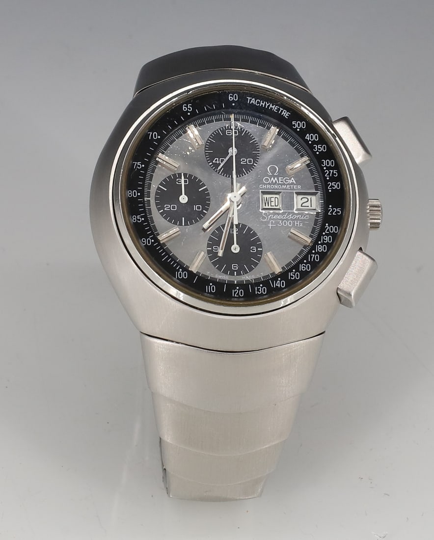 OMEGA CHRONOMETER SPEEDSONIC 300 HZ WRIST WATCH: STAINLESS STEEL CASE AND BAND #38416749 SEAMASTER SWITZERLAND AND PAPERWORK 1 1/2" DIA DIAL PLEASE READ CAREFULLY - ITEMS MUST BE PAID FOR THROUGH LIVE AUCTIONEERS OR WITH CASH OR CHECK IN